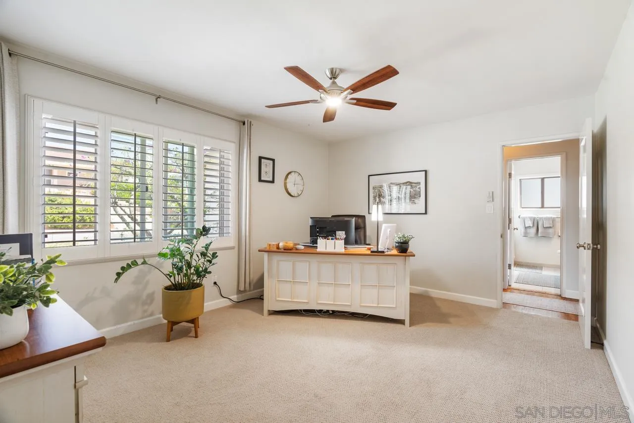 6365 Lambda Drive San Diego, CA 92120 - Photo 16 of 31 a living room with furniture and potted plant