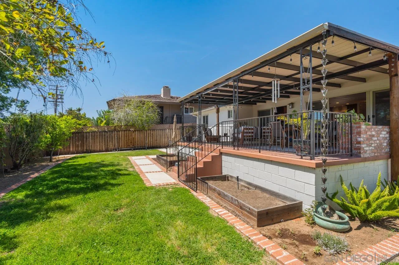 6365 Lambda Drive San Diego, CA 92120 - Photo 28 of 31 a view of a house with backyard and sitting area