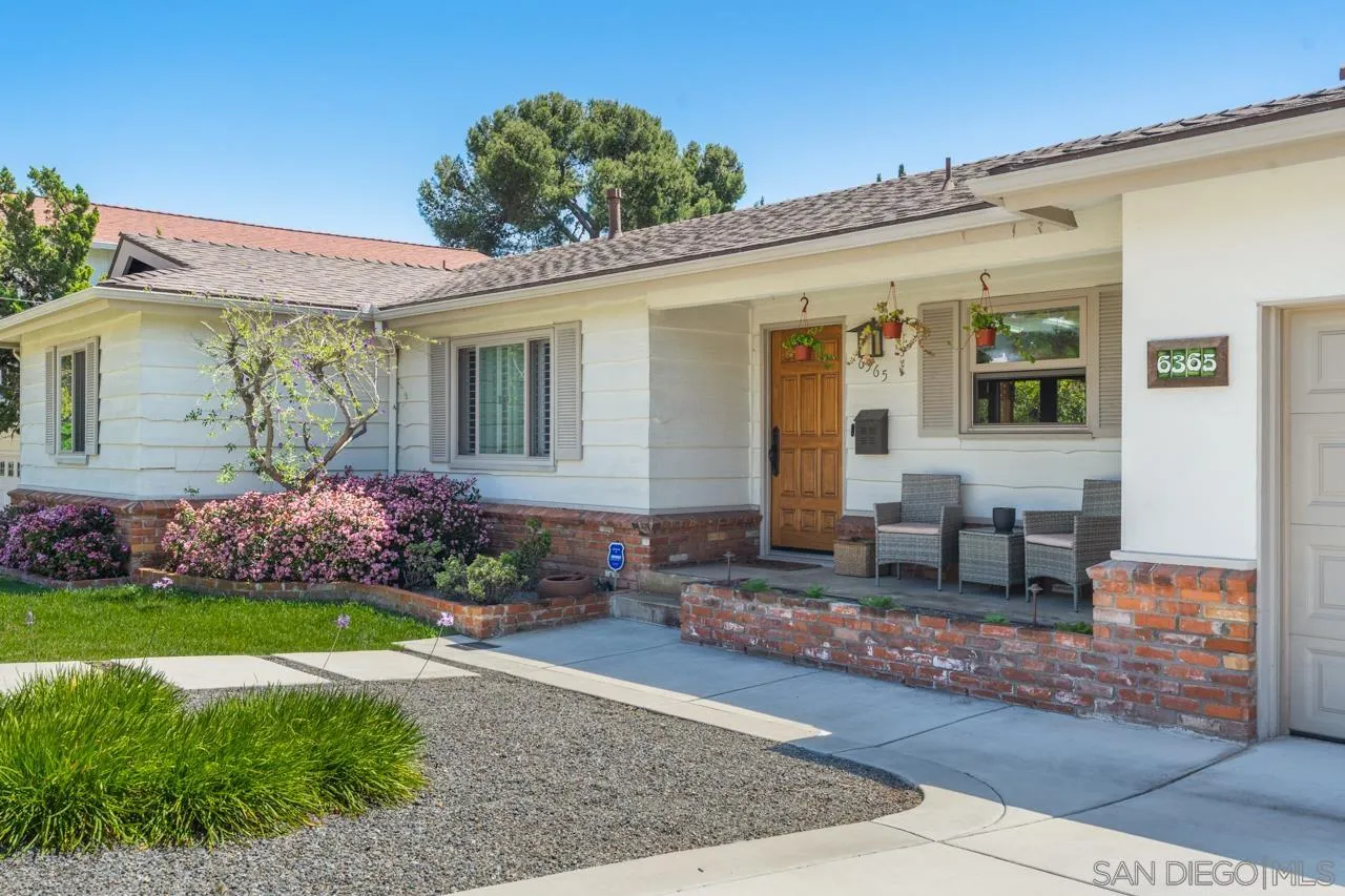 6365 Lambda Drive San Diego, CA 92120 - Photo 30 of 31 a front view of a house with a porch