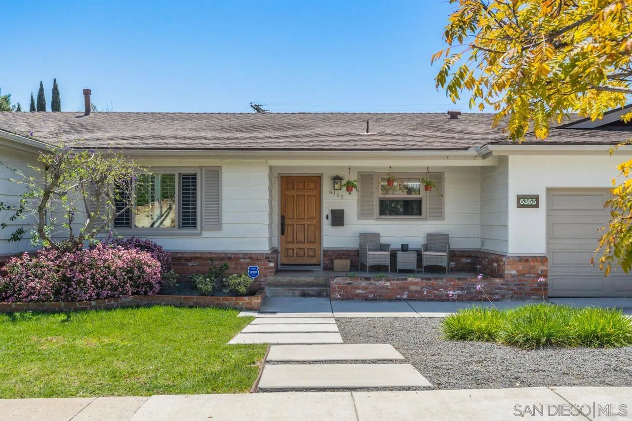 6365 Lambda Drive San Diego, CA 92120 - Photo 31 of 31 a front view of a house with garden