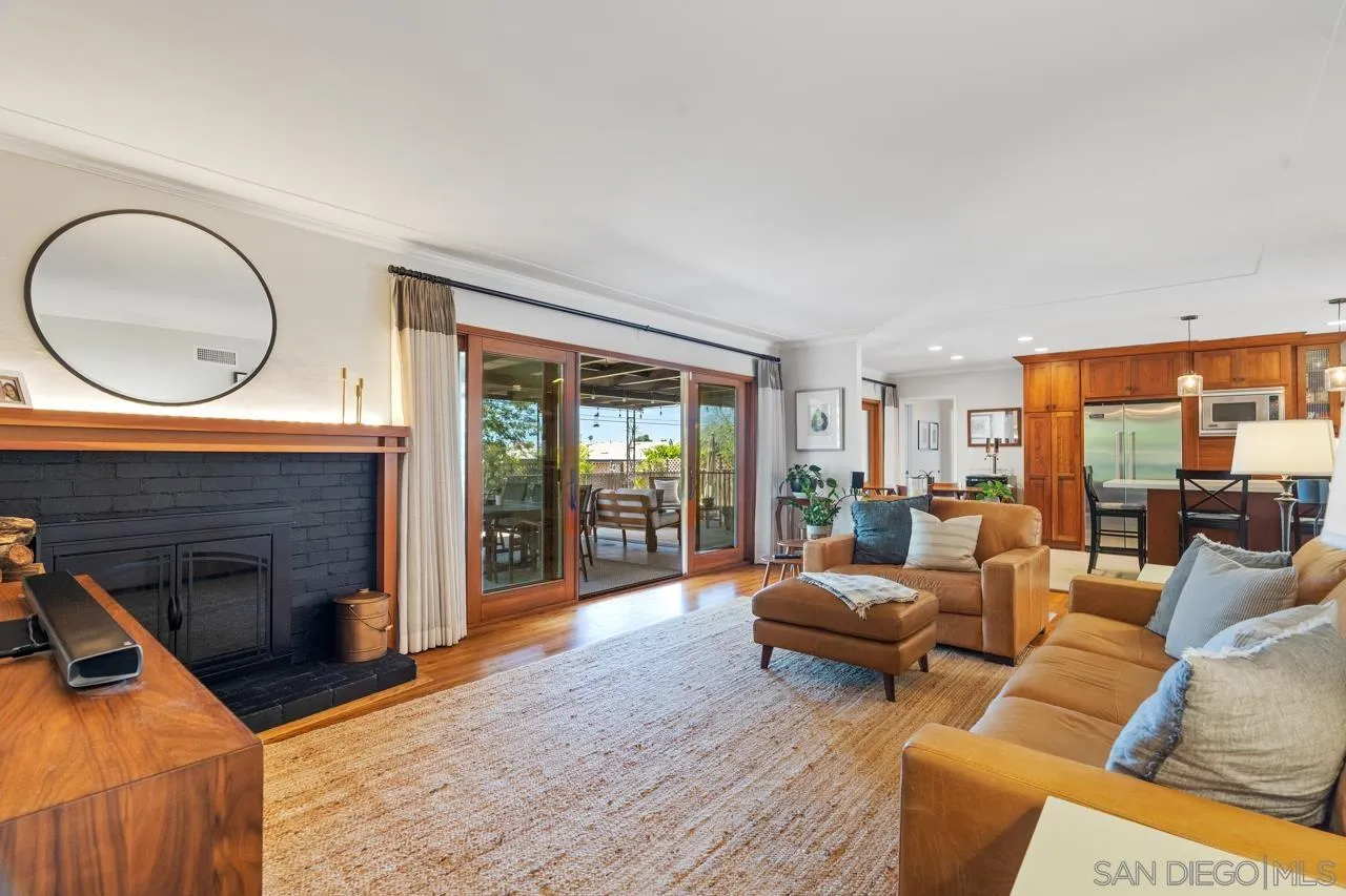 6365 Lambda Drive San Diego, CA 92120 - Photo 7 of 31 a living room with furniture and a fireplace