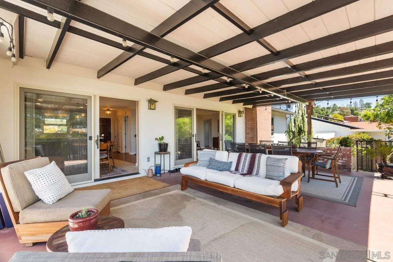 6365 Lambda Drive San Diego, CA 92120 - Photo 10 of 31 a living room with furniture and a large window
