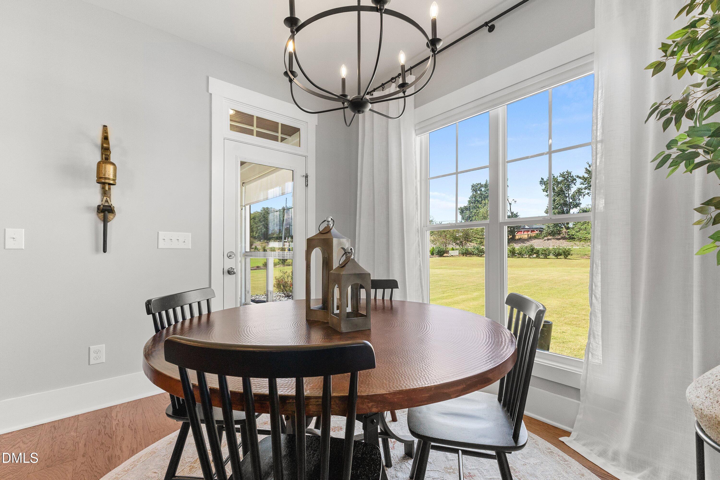 248 Old Hickory Drive Raleigh, NC 27603 - Photo 21 of 45 a view of a dining room with furniture window and outside view