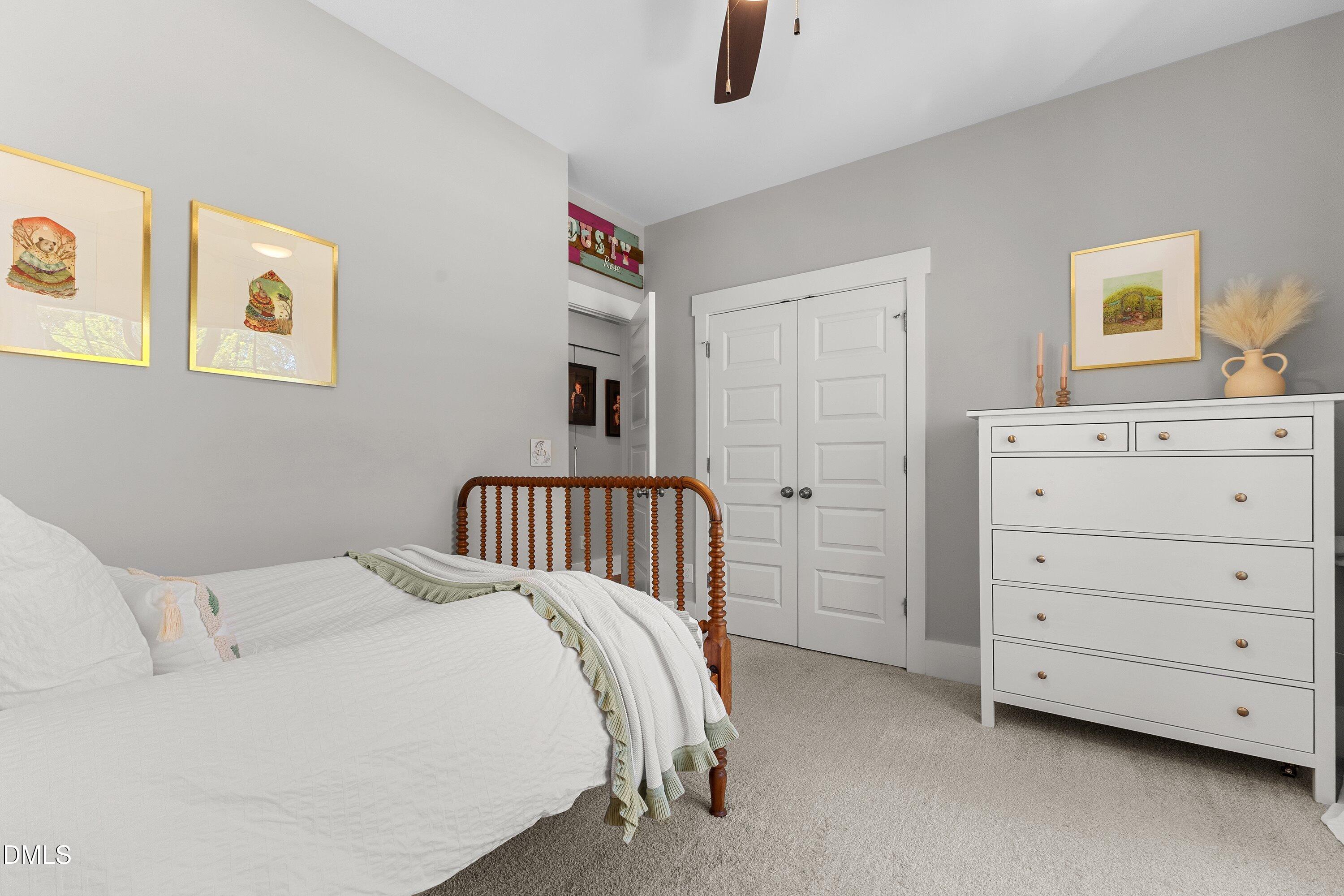 248 Old Hickory Drive Raleigh, NC 27603 - Photo 22 of 45 a bedroom with a bed and a dresser