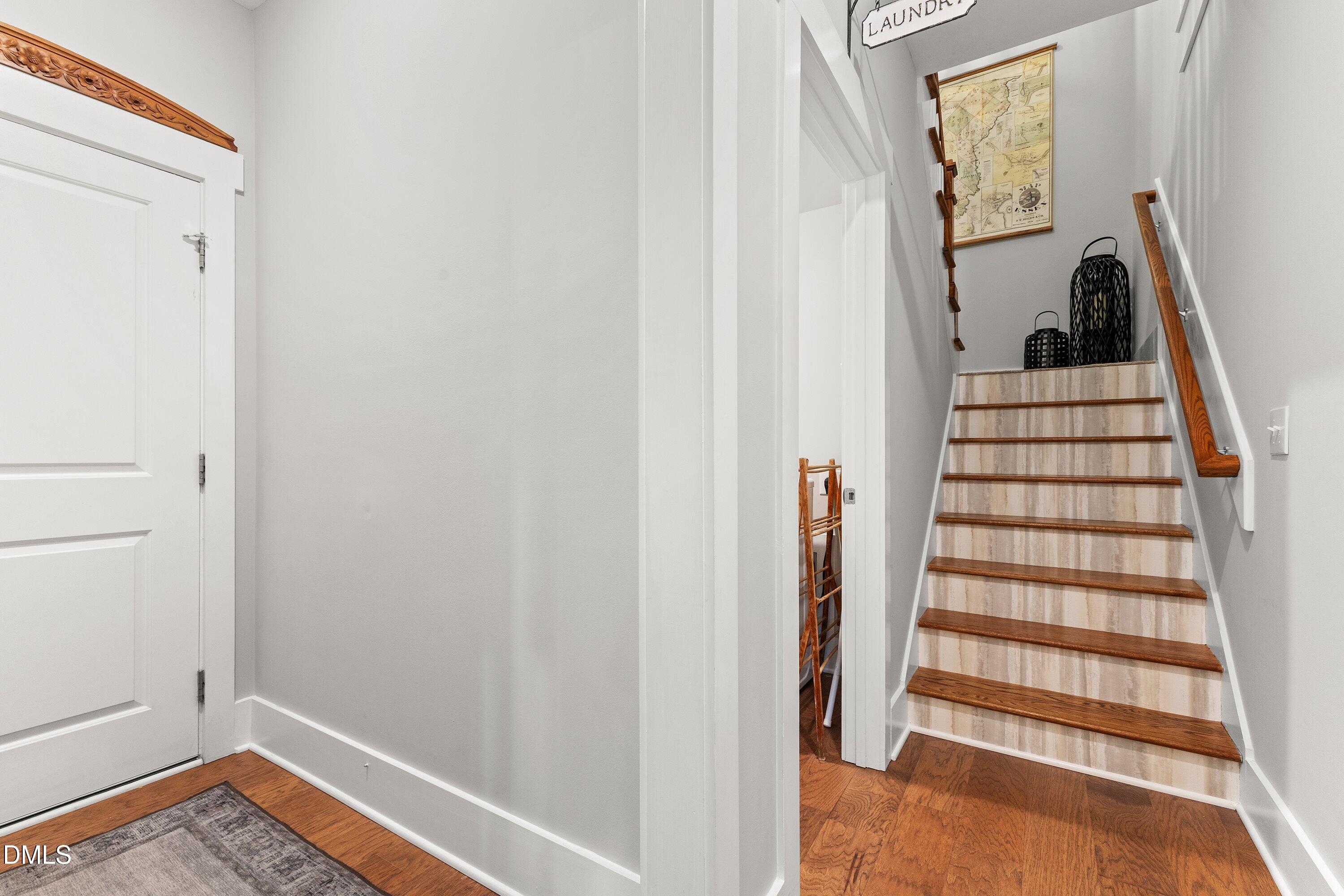 248 Old Hickory Drive Raleigh, NC 27603 - Photo 25 of 45 a view of front door with wooden floor