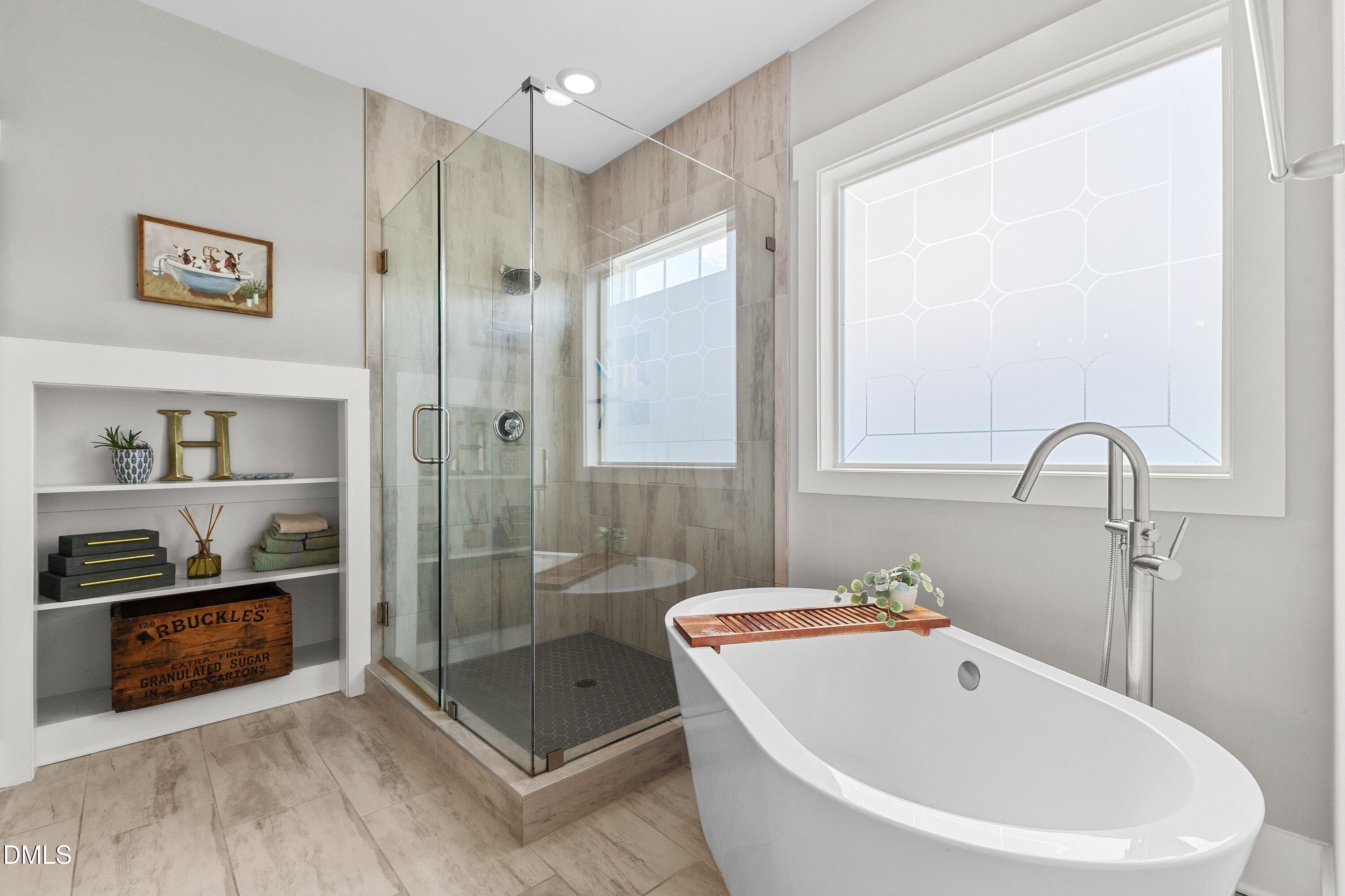 248 Old Hickory Drive Raleigh, NC 27603 - Photo 30 of 45 a bathroom with a bathtub and a shower