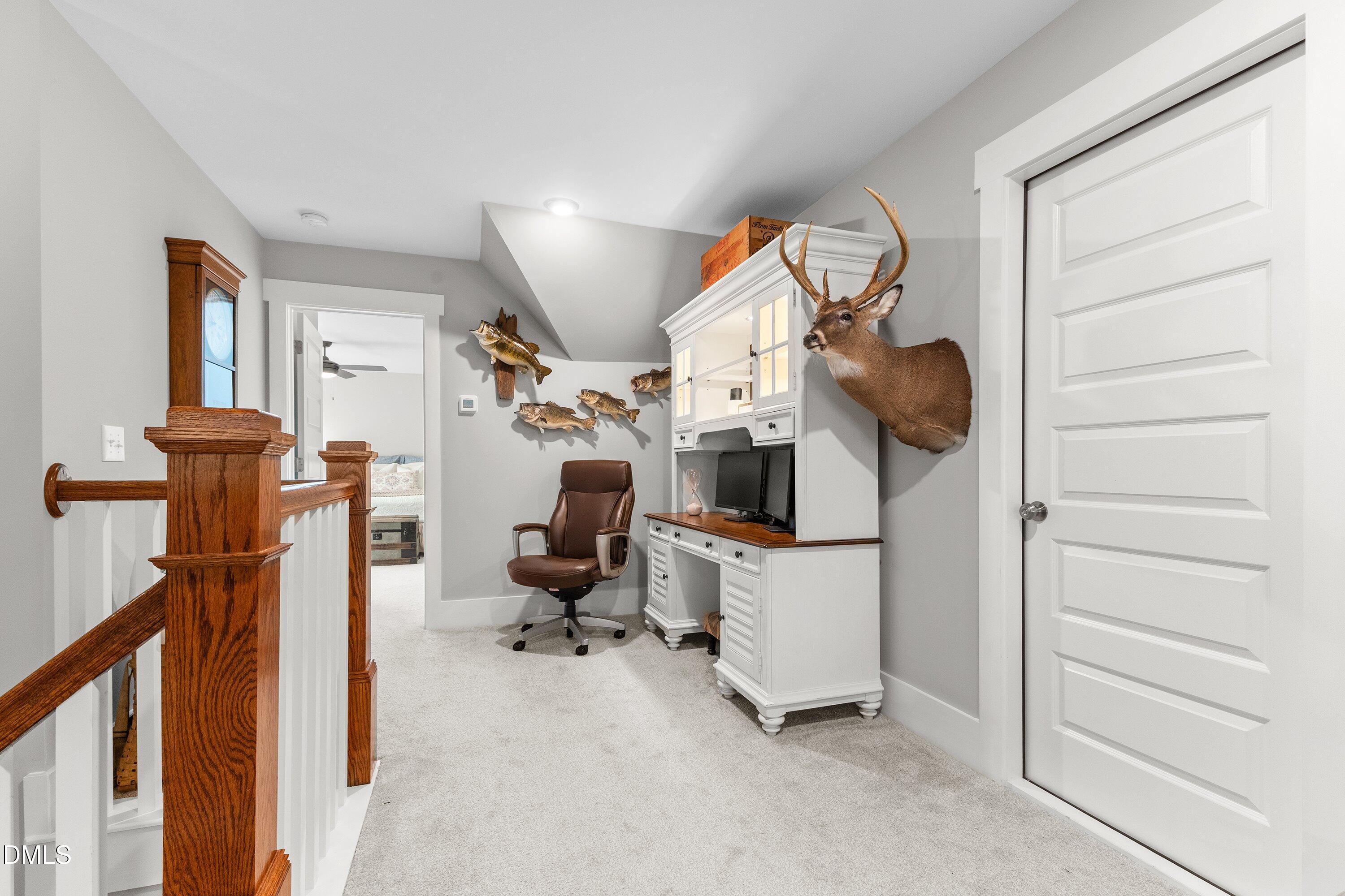 248 Old Hickory Drive Raleigh, NC 27603 - Photo 34 of 45 a view of a hallway with workspace and a window