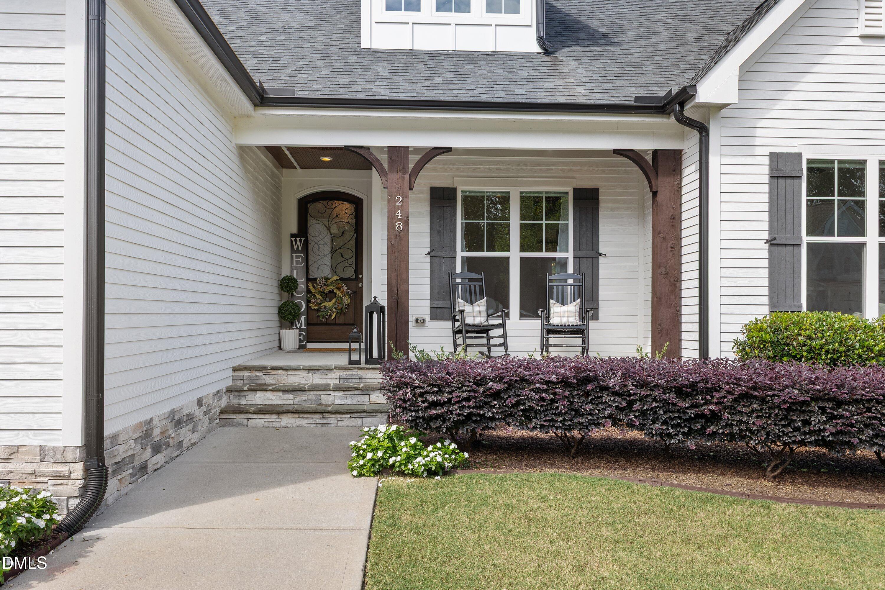 248 Old Hickory Drive Raleigh, NC 27603 - Photo 6 of 45 a front view of a house with garden
