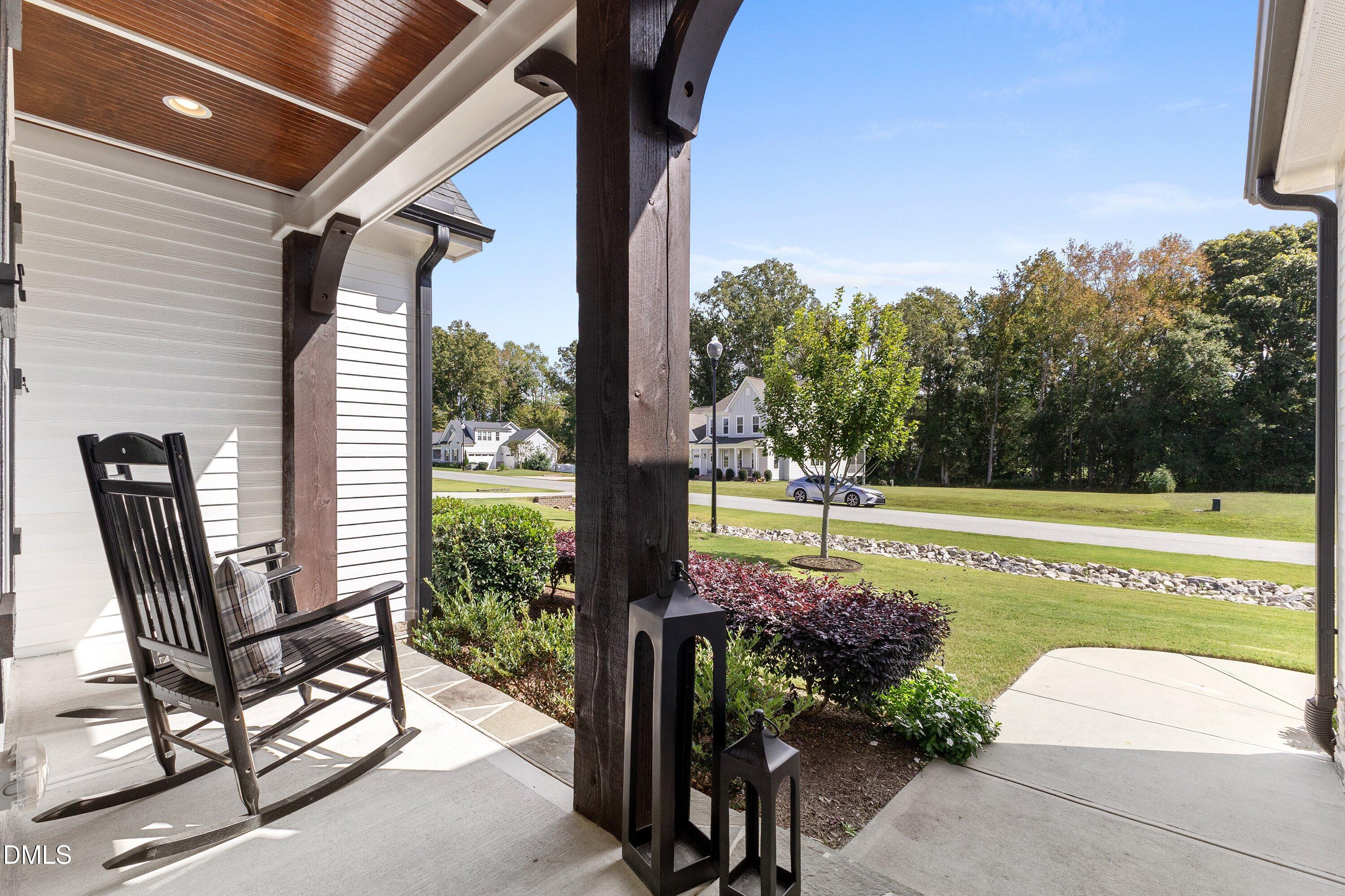 248 Old Hickory Drive Raleigh, NC 27603 - Photo 7 of 45 a view of a patio with a table chairs and a yard