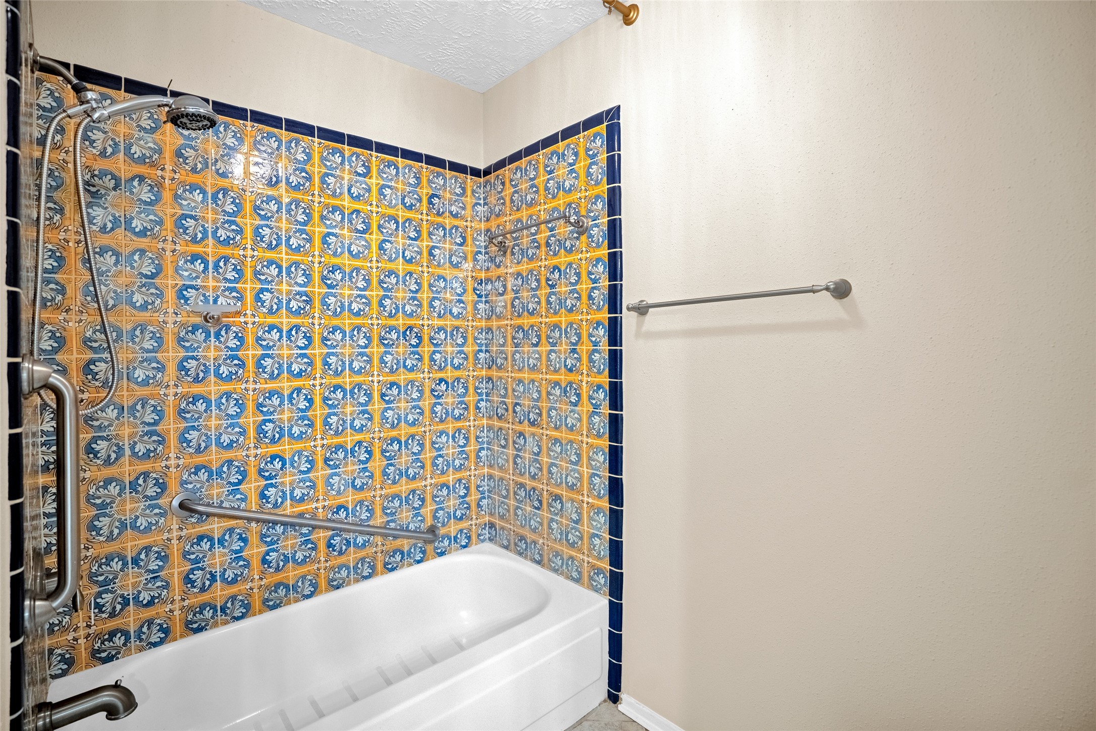 17323 Northchapel Street Spring, TX 77379 - Photo 31 of 37 Additional view of the bathroom showcasing decorative tile work and clean, well-maintained finishes.