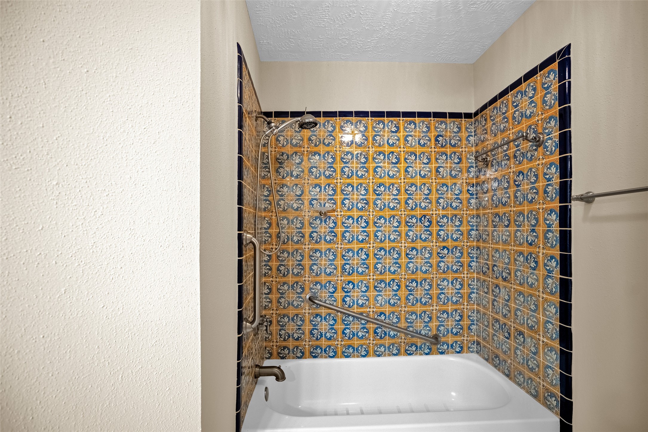 17323 Northchapel Street Spring, TX 77379 - Photo 32 of 37 Additional view of the bathroom showcasing decorative tile work and clean, well-maintained finishes.