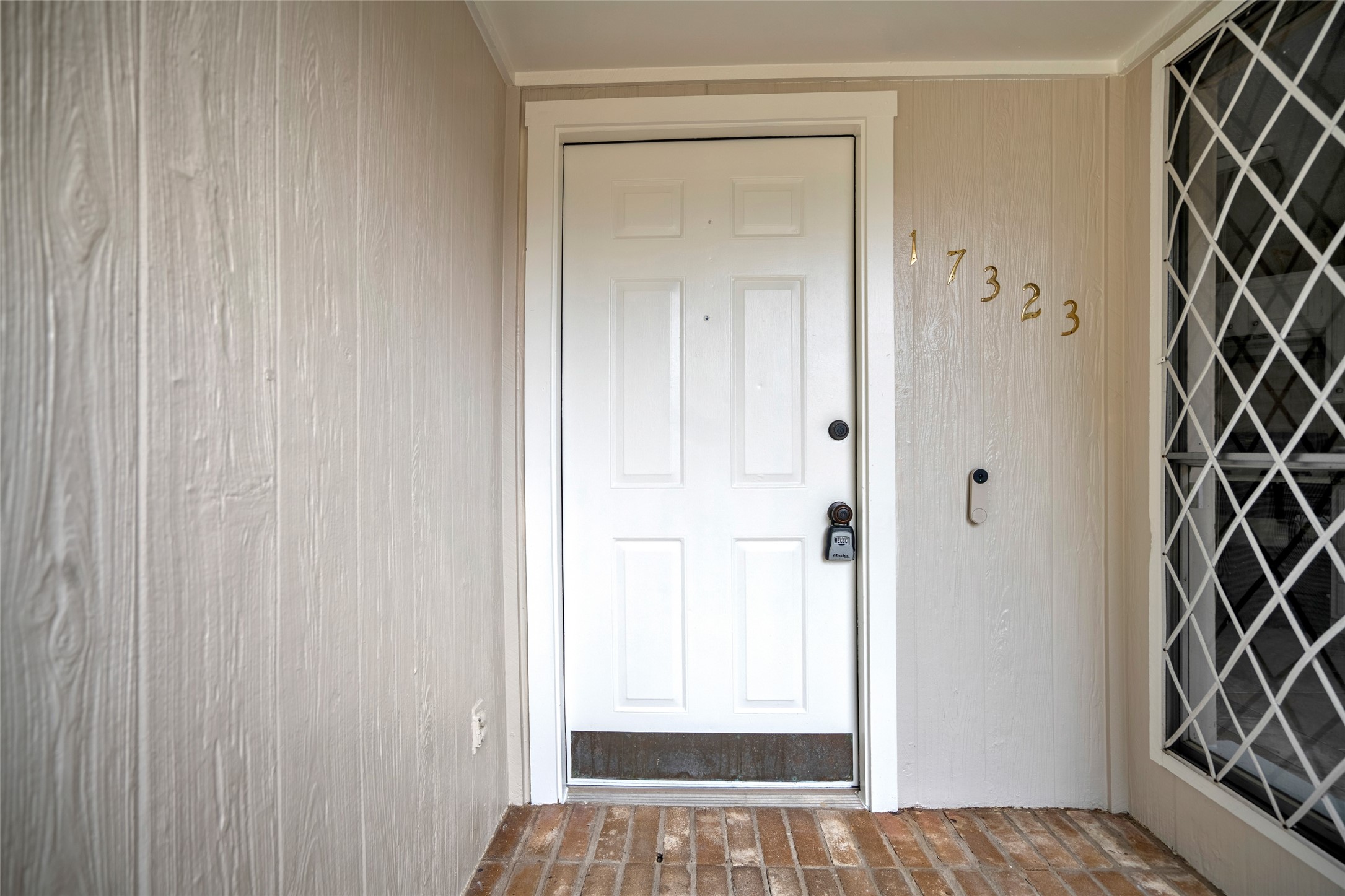 17323 Northchapel Street Spring, TX 77379 - Photo 4 of 37 Welcoming covered front entry with clean lines and neutral finishes.