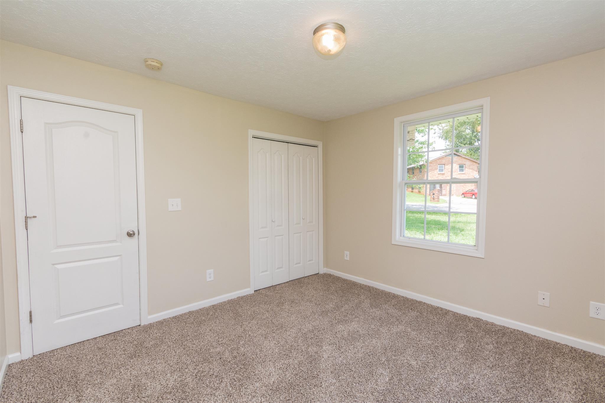 318 Burch Road Clarksville, TN 37042 - Photo 12 of 15 an empty room with windows