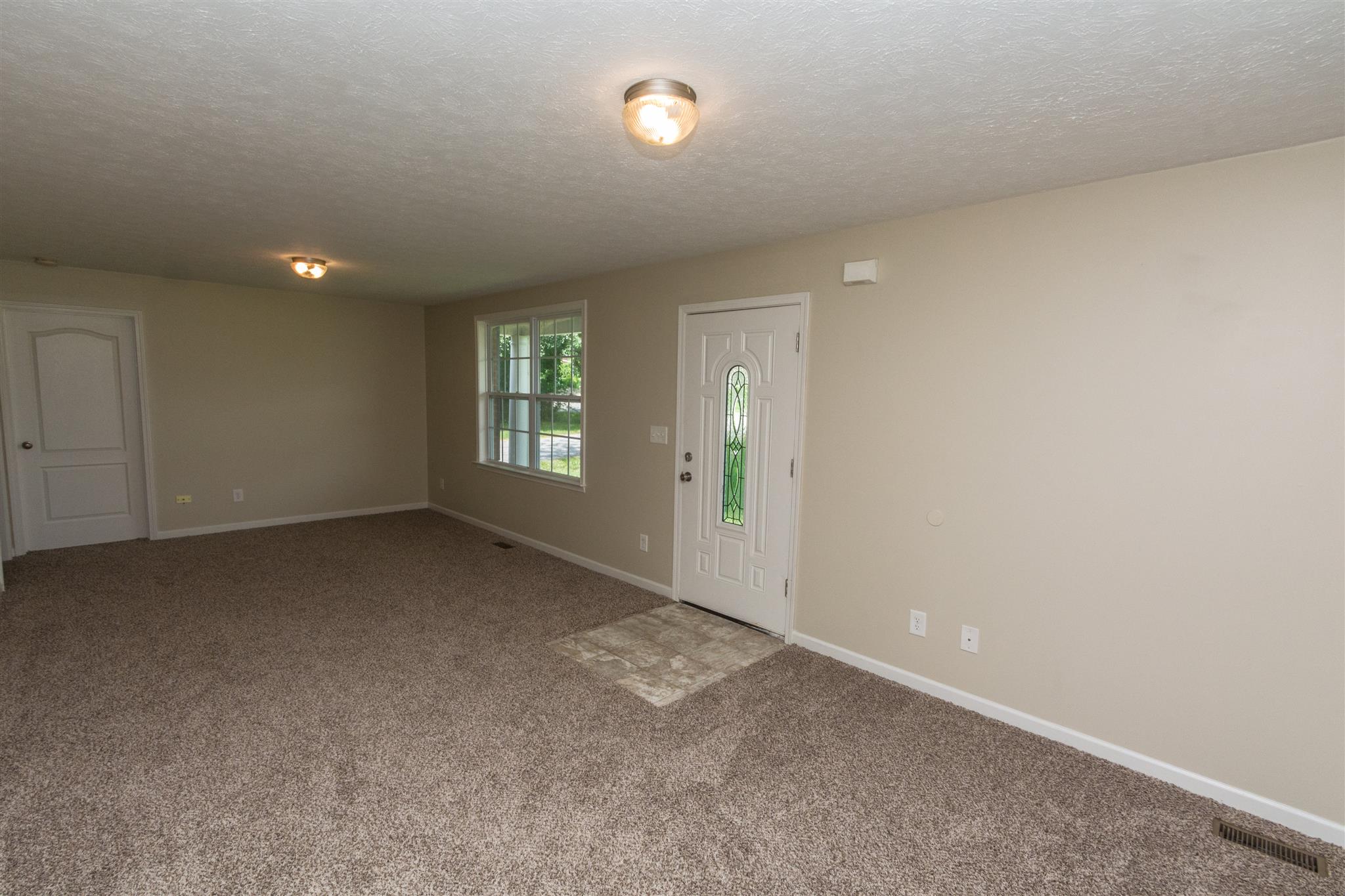 318 Burch Road Clarksville, TN 37042 - Photo 5 of 15 an empty room with windows
