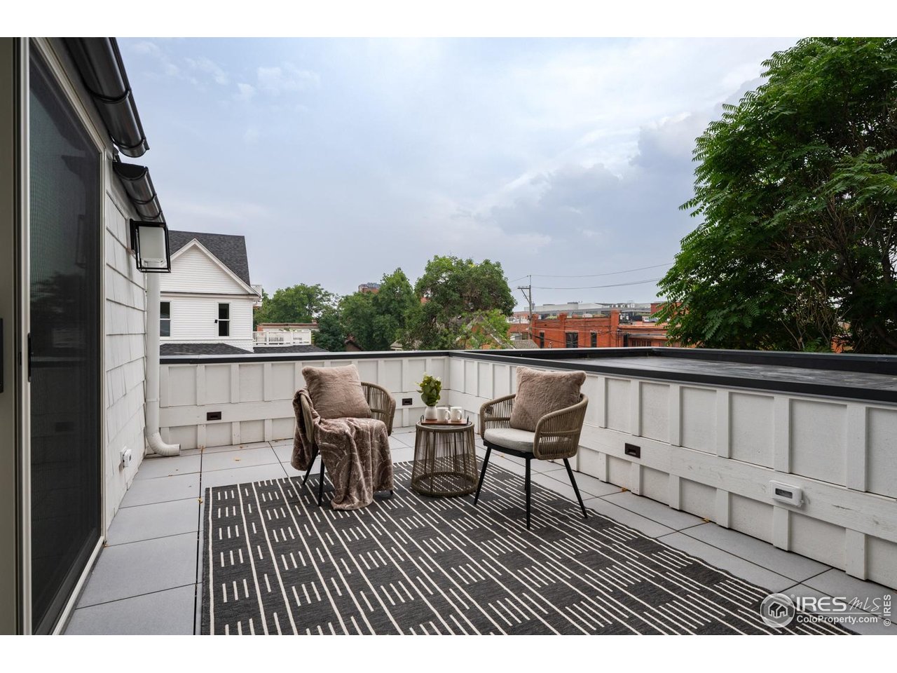 934 Spruce Street Boulder, CO 80302 - Photo 24 of 49 Enjoy slow mornings and quiet evenings on the rooftop deck.