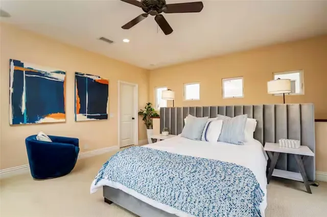 a bed room with a bed and a television