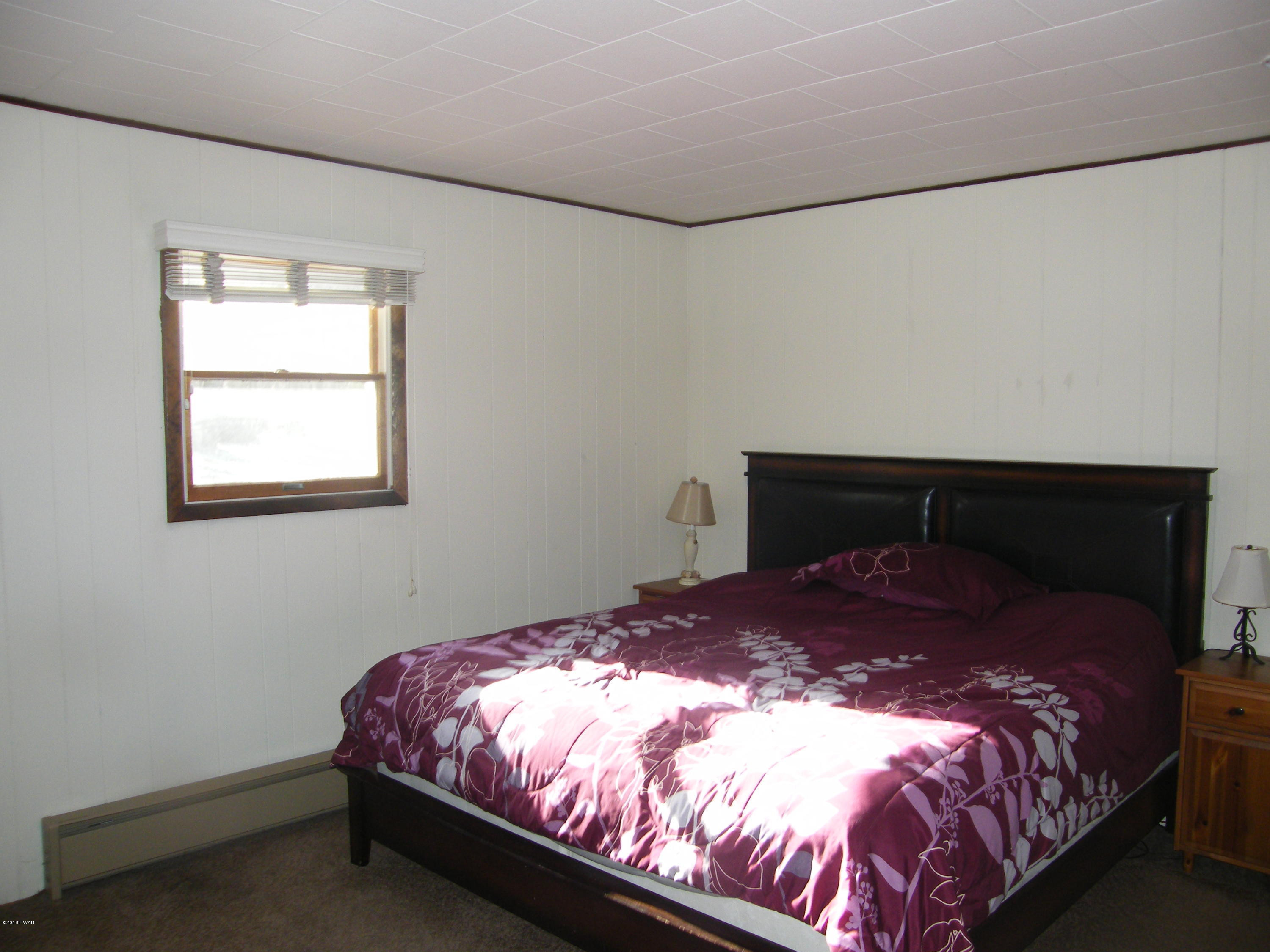 121 Dark Swamp Road Dingmans Ferry, PA 18328 - Photo 17 of 24 Master Bedroom