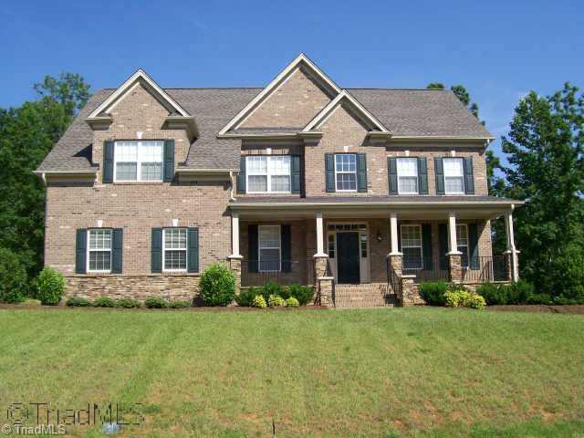 7889 Newhaven Drive Oak Ridge, NC 27310 - Photo 1 of 9 Exterior Front.