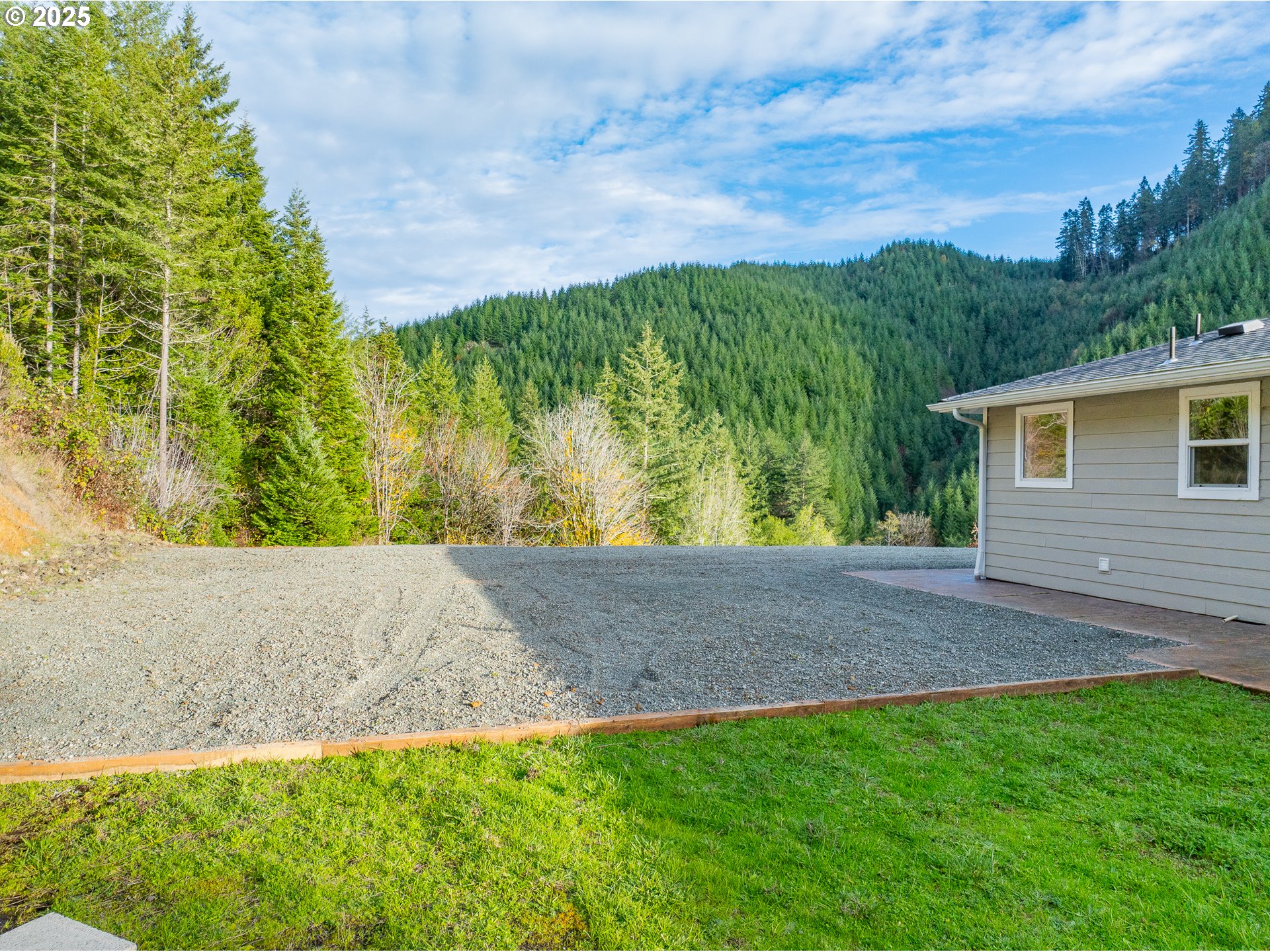 16855 Highway 42 Myrtle Point, OR 97458 - Photo 36 of 43 a view of back yard of the house with green space