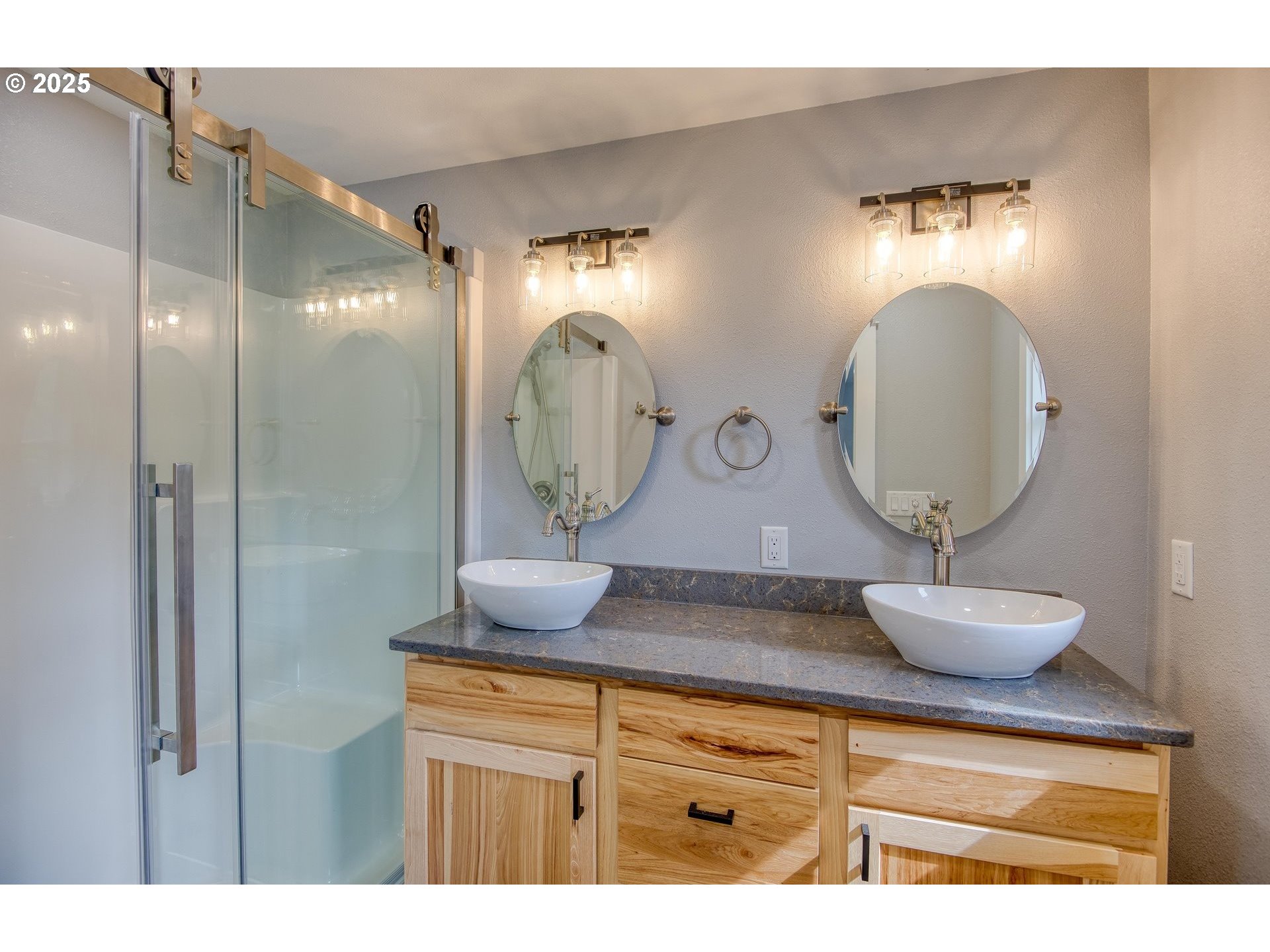 16855 Highway 42 Myrtle Point, OR 97458 - Photo 9 of 43 a bathroom with a double vanity sink and a mirror