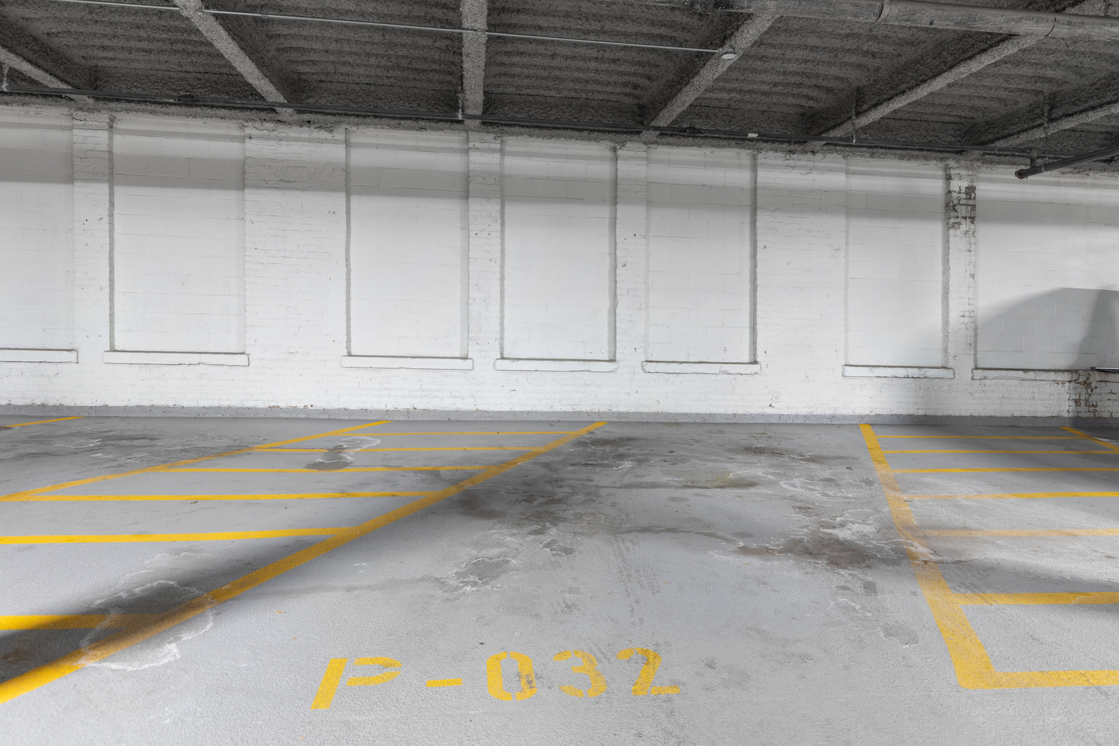 1040 West Adams Street, Unit 105 Chicago, IL 60607 - Photo 17 of 18 a view of a room with wooden floor