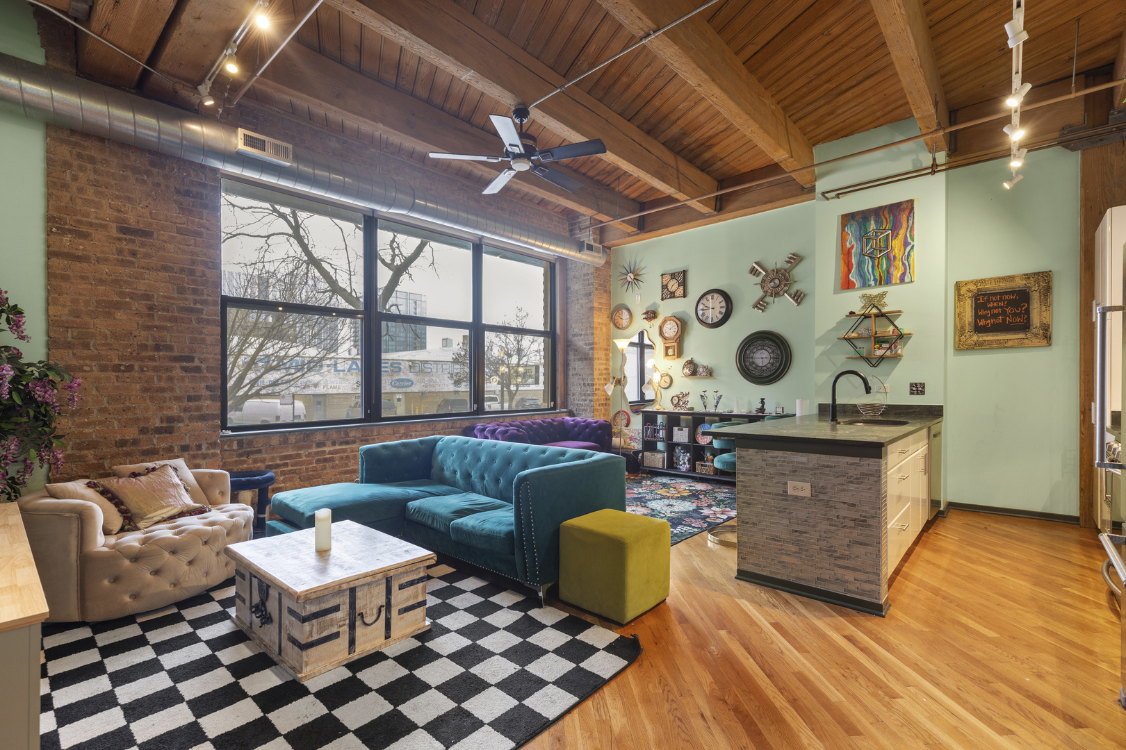 1040 West Adams Street, Unit 105 Chicago, IL 60607 - Photo 4 of 18 a living room with furniture and a wooden floor