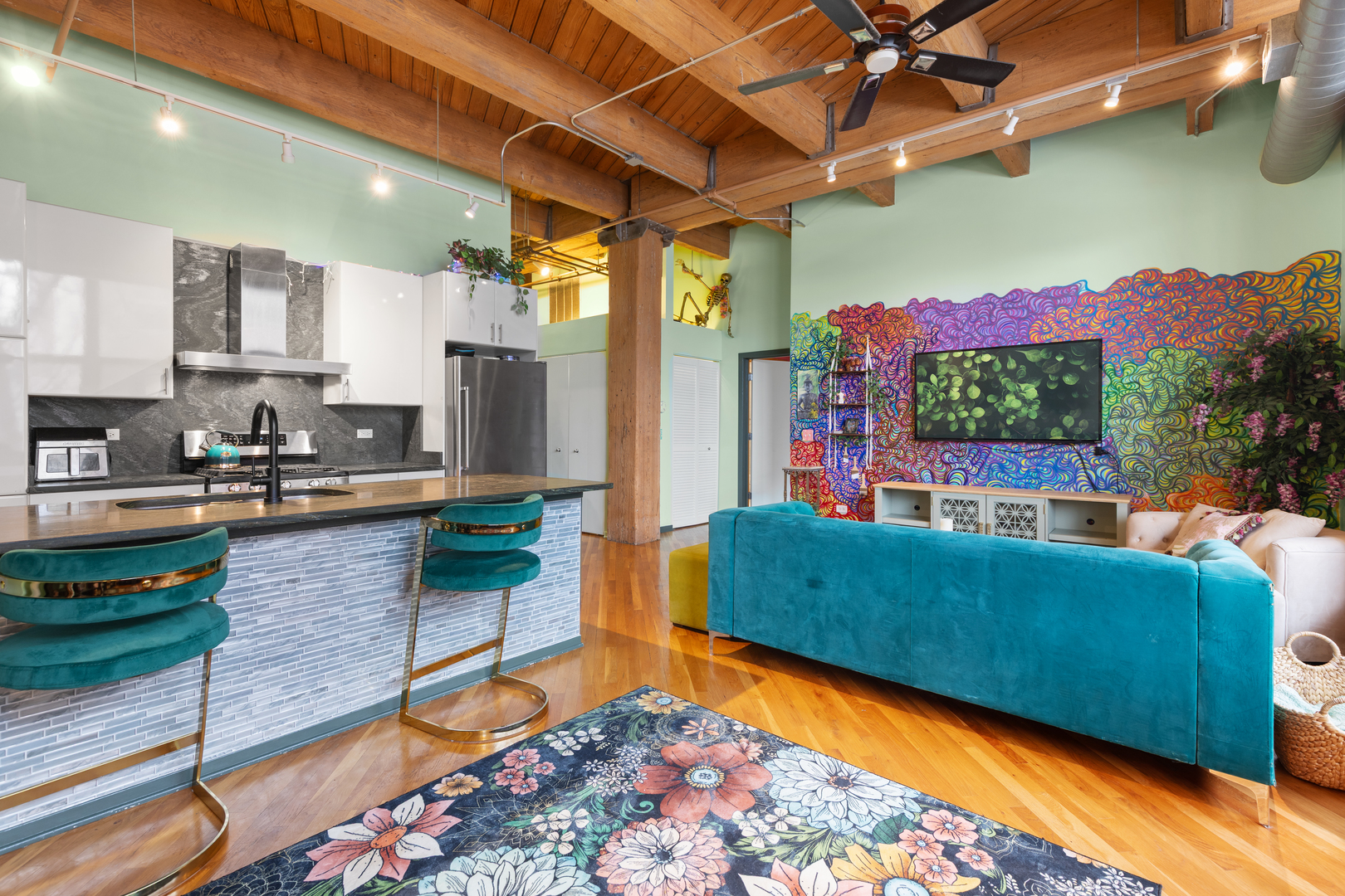 1040 West Adams Street, Unit 105 Chicago, IL 60607 - Photo 5 of 18 a living room with furniture and a floor to ceiling window and potted plants
