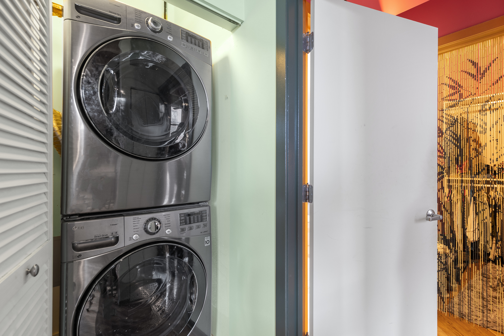 1040 West Adams Street, Unit 105 Chicago, IL 60607 - Photo 9 of 18 a view of washer and dryer in a utility room