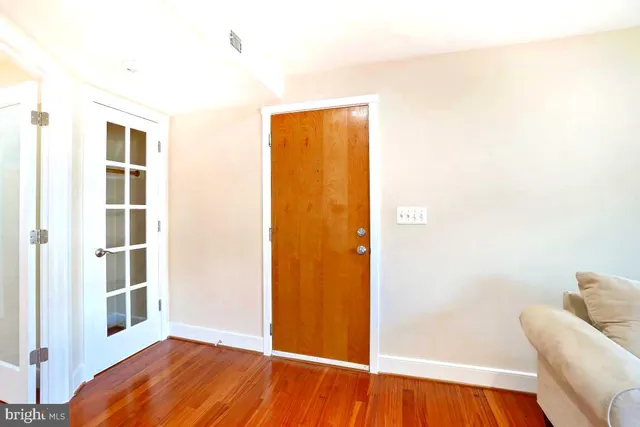 a view of livingroom with furniture and wooden floor