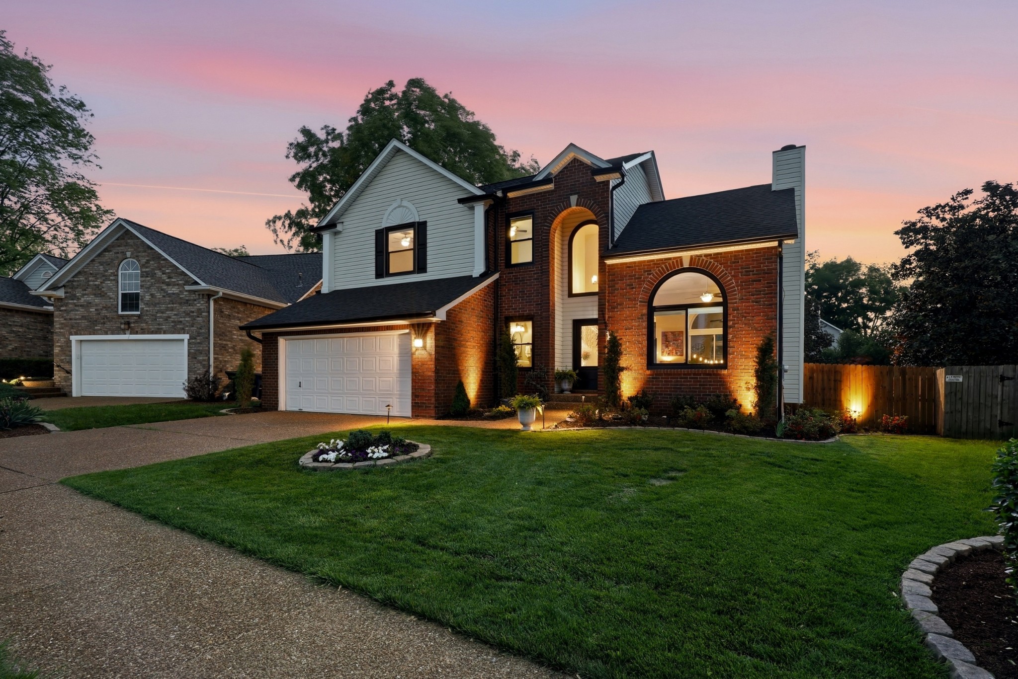 224 Cavalcade Circle Franklin, TN 37069 - Photo 1 of 39 a front view of a house with a yard and garage