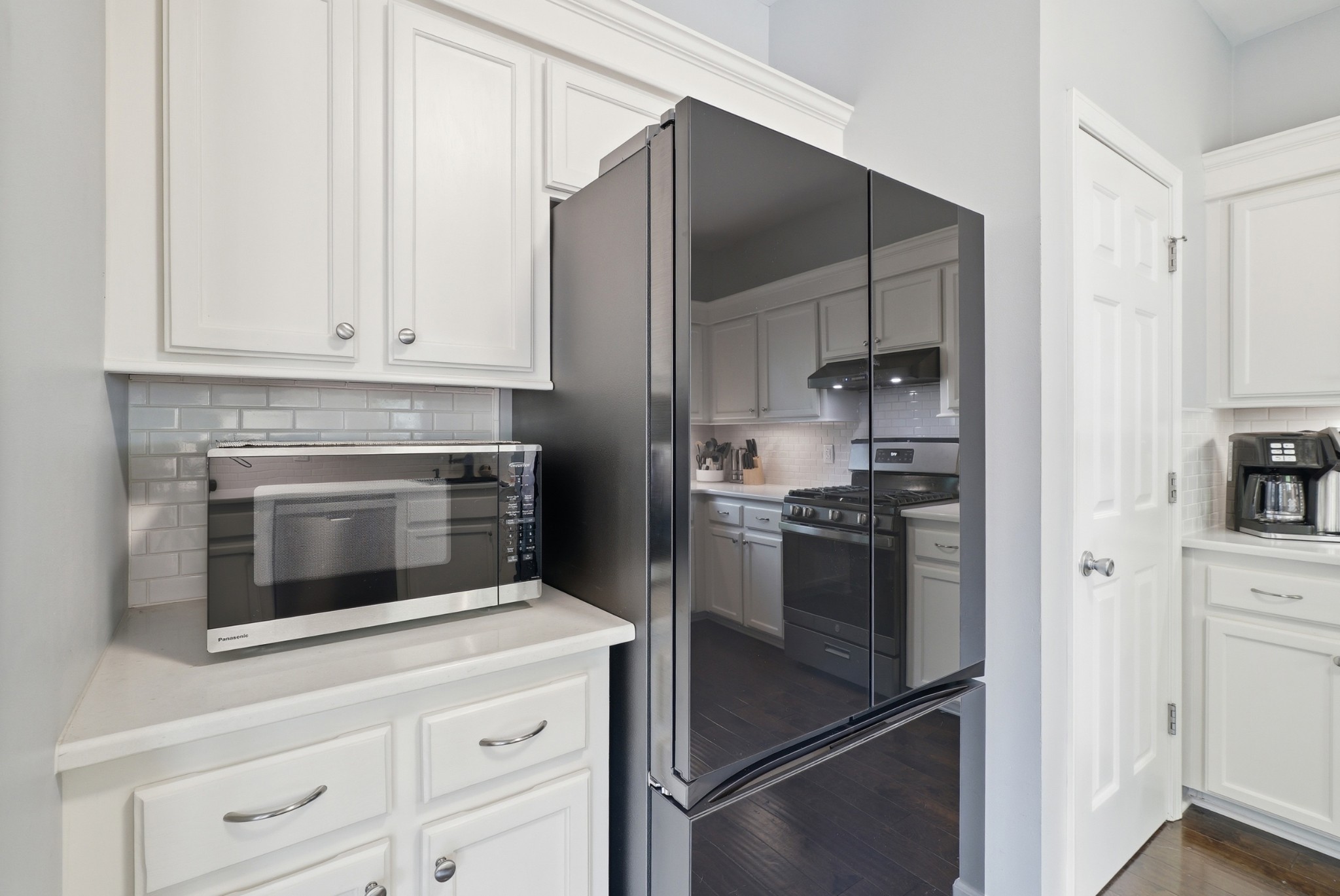 224 Cavalcade Circle Franklin, TN 37069 - Photo 12 of 39 a kitchen with appliances cabinets and a counter top space