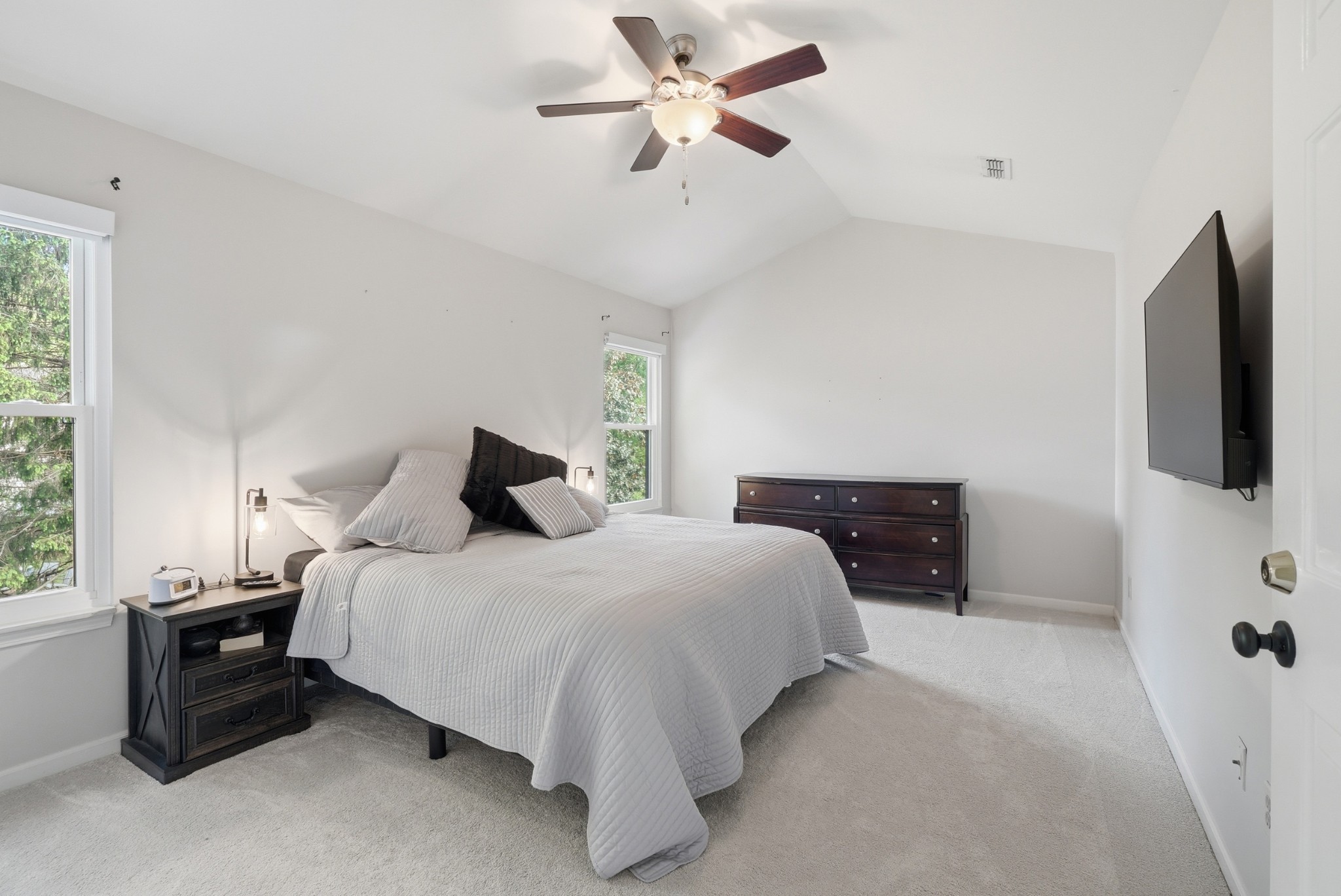 224 Cavalcade Circle Franklin, TN 37069 - Photo 18 of 39 a bedroom with a bed and a flat tv screen on dresser
