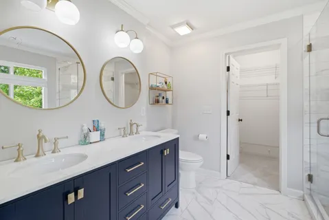 a bathroom with a bathtub and a shower