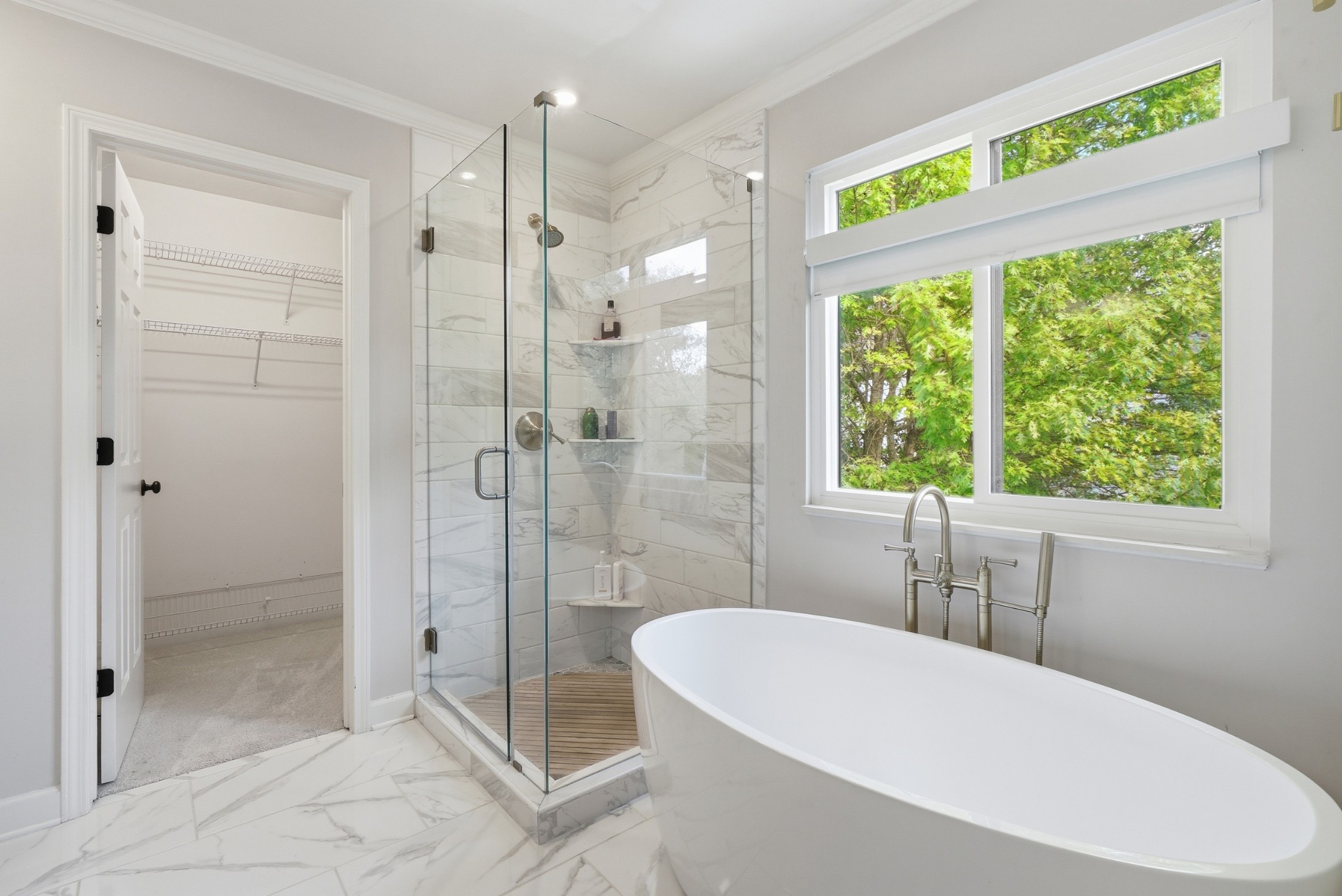 224 Cavalcade Circle Franklin, TN 37069 - Photo 20 of 39 a bathroom with a bathtub and a shower