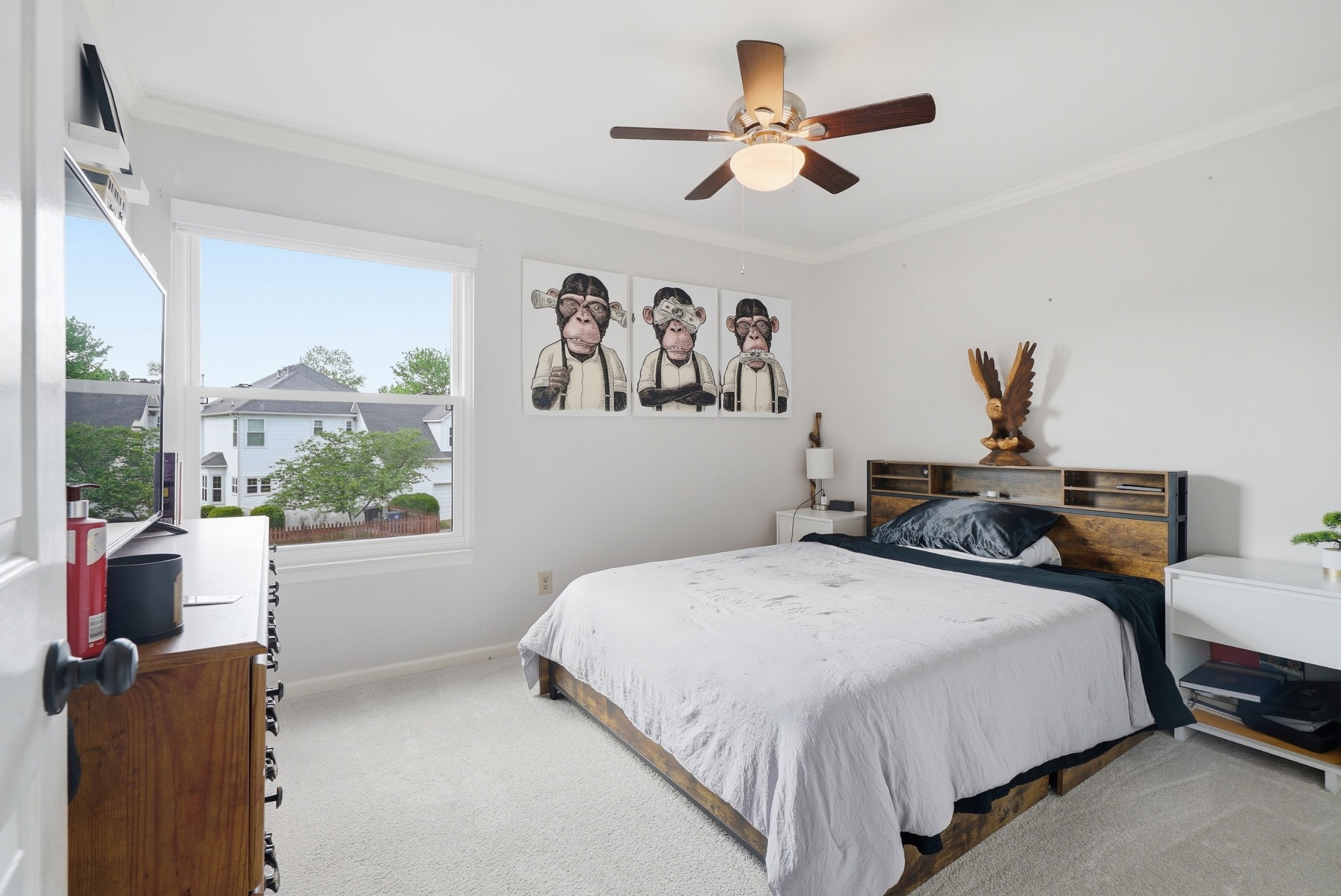 224 Cavalcade Circle Franklin, TN 37069 - Photo 24 of 39 a bedroom with a bed painting on the wall and a large window