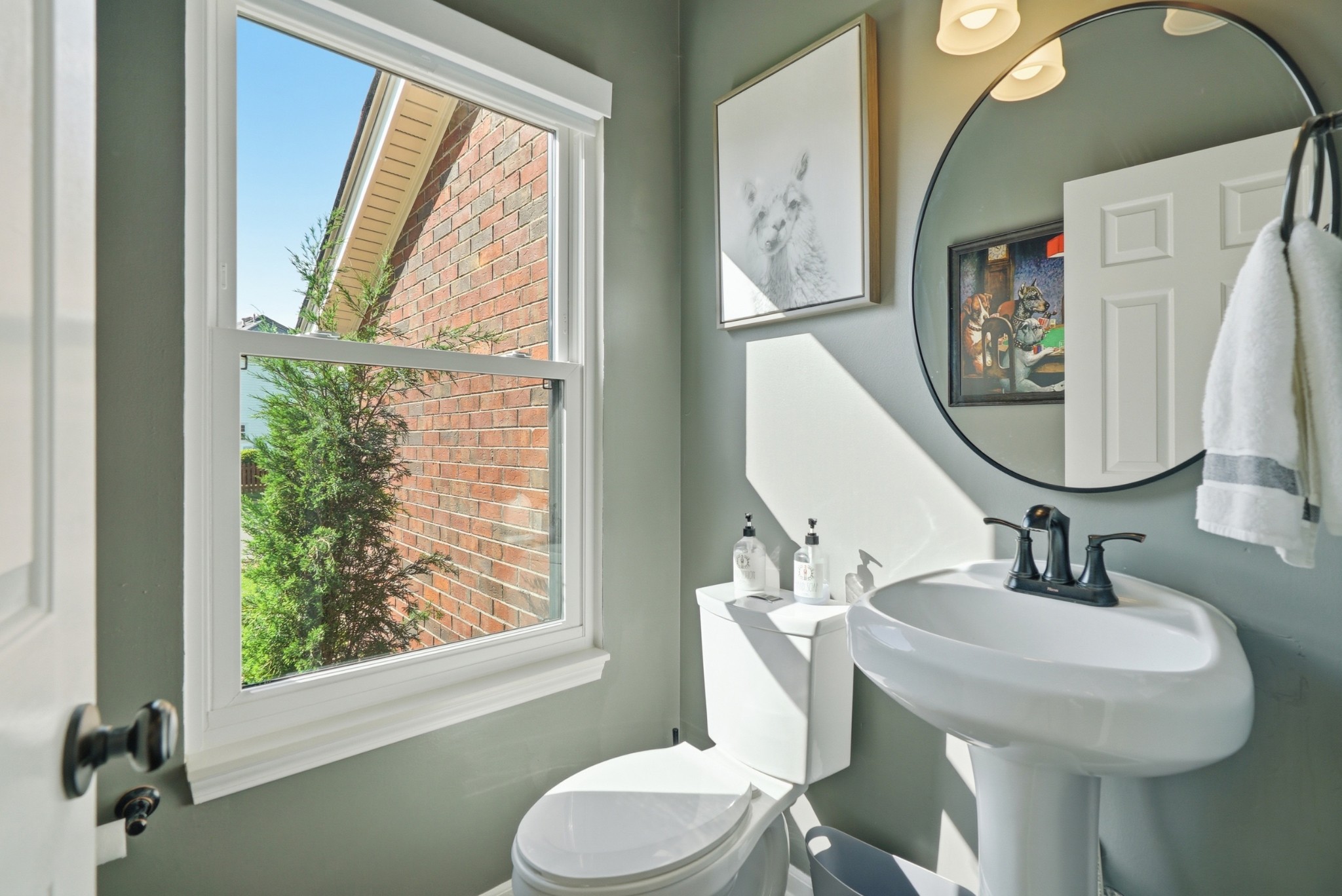 224 Cavalcade Circle Franklin, TN 37069 - Photo 26 of 39 a bathroom with a toilet a sink and a mirror