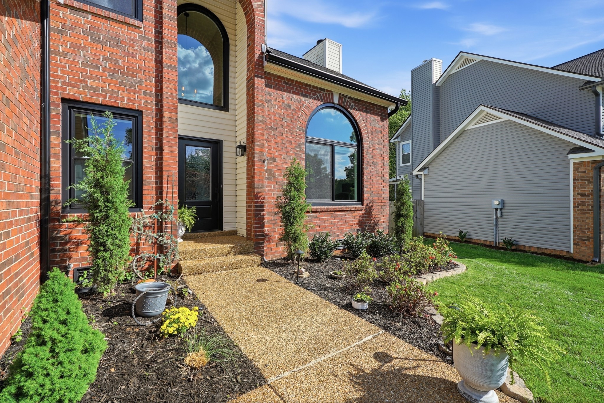 224 Cavalcade Circle Franklin, TN 37069 - Photo 38 of 39 a front view of a house with garden
