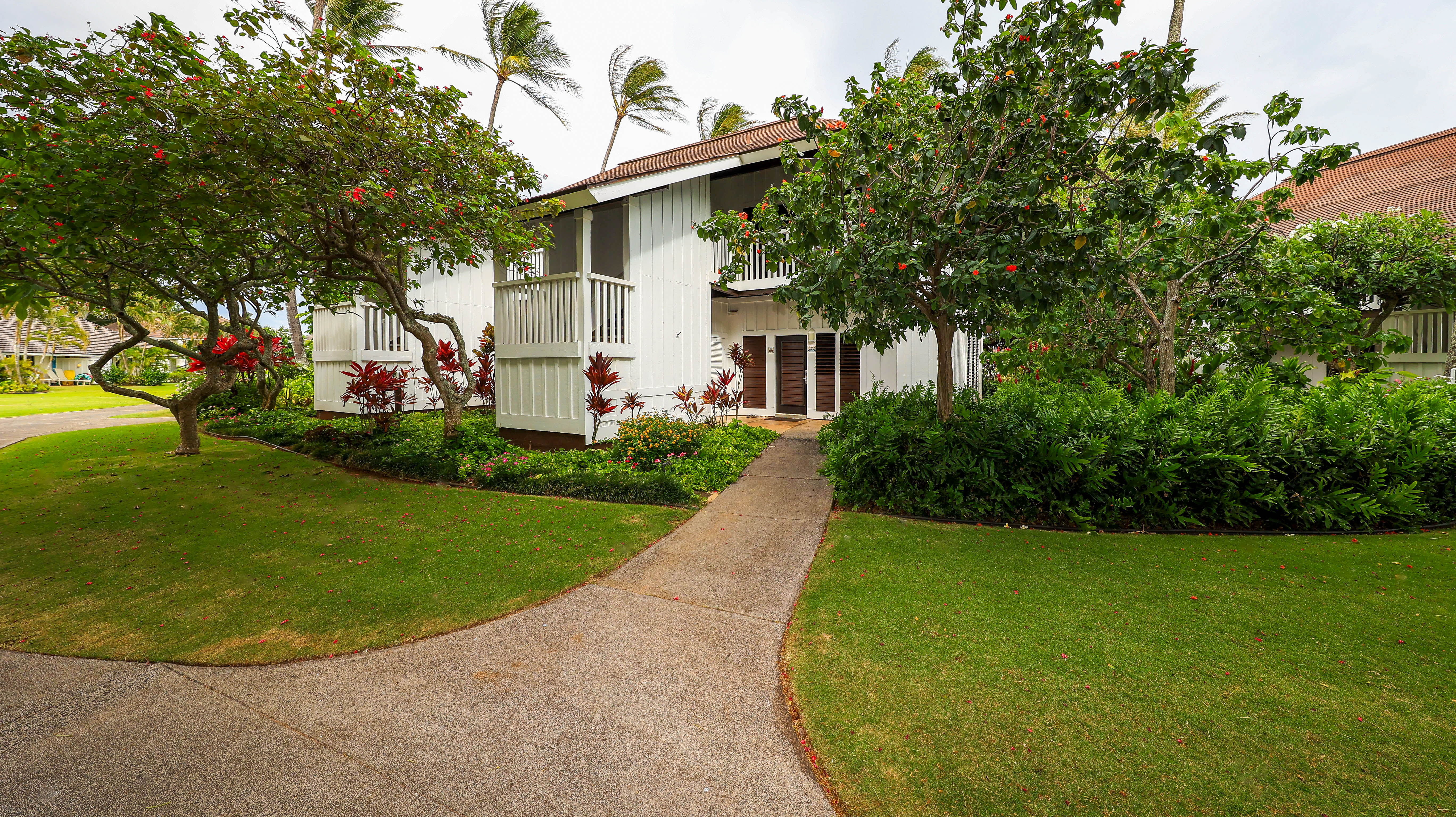 2253 Poipu Road, Unit 183 Koloa, HI 96756 - Photo 11 of 30 a view of a house with a backyard