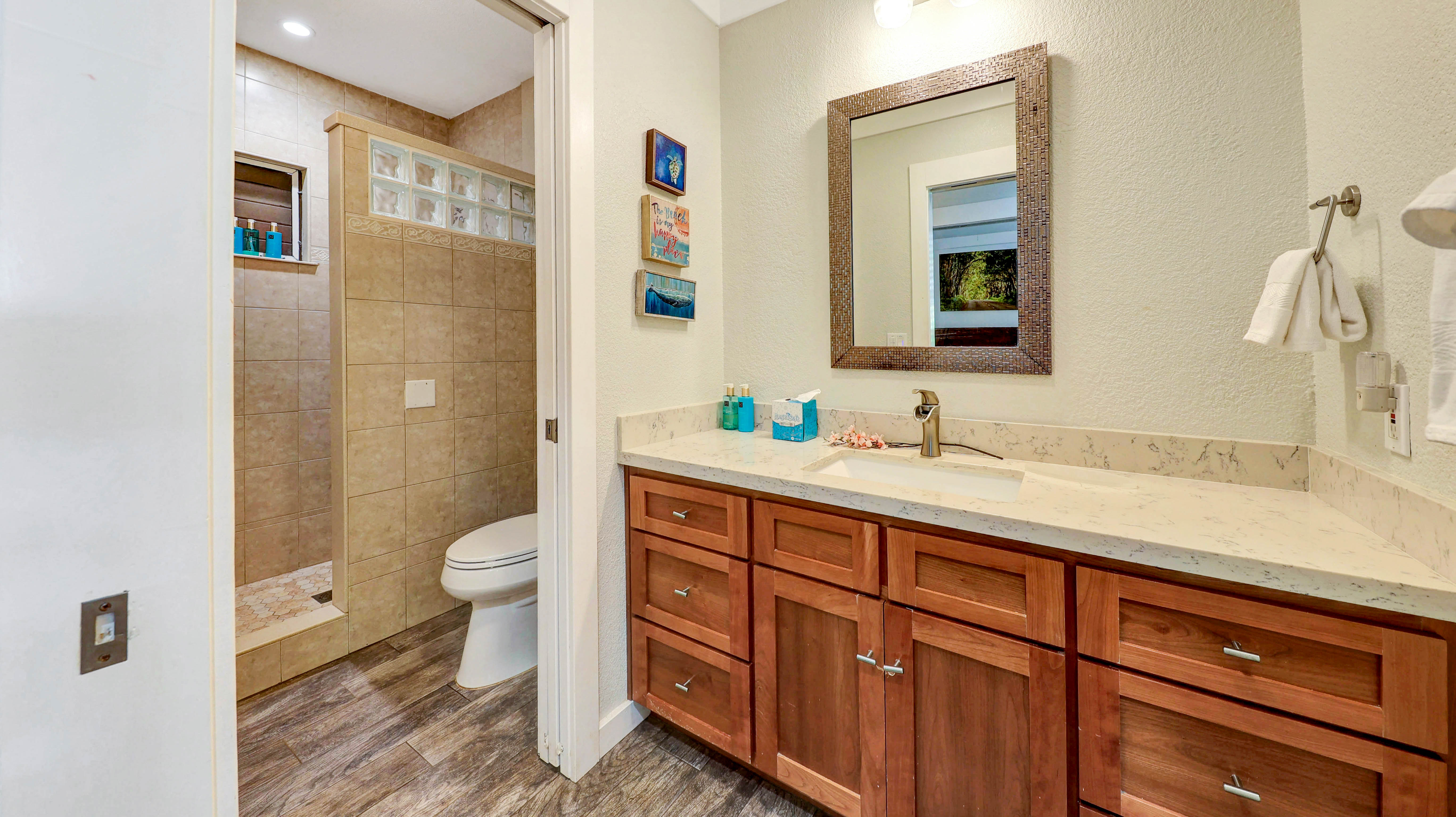 2253 Poipu Road, Unit 183 Koloa, HI 96756 - Photo 21 of 30 a spacious bathroom with a granite countertop sink toilet and shower