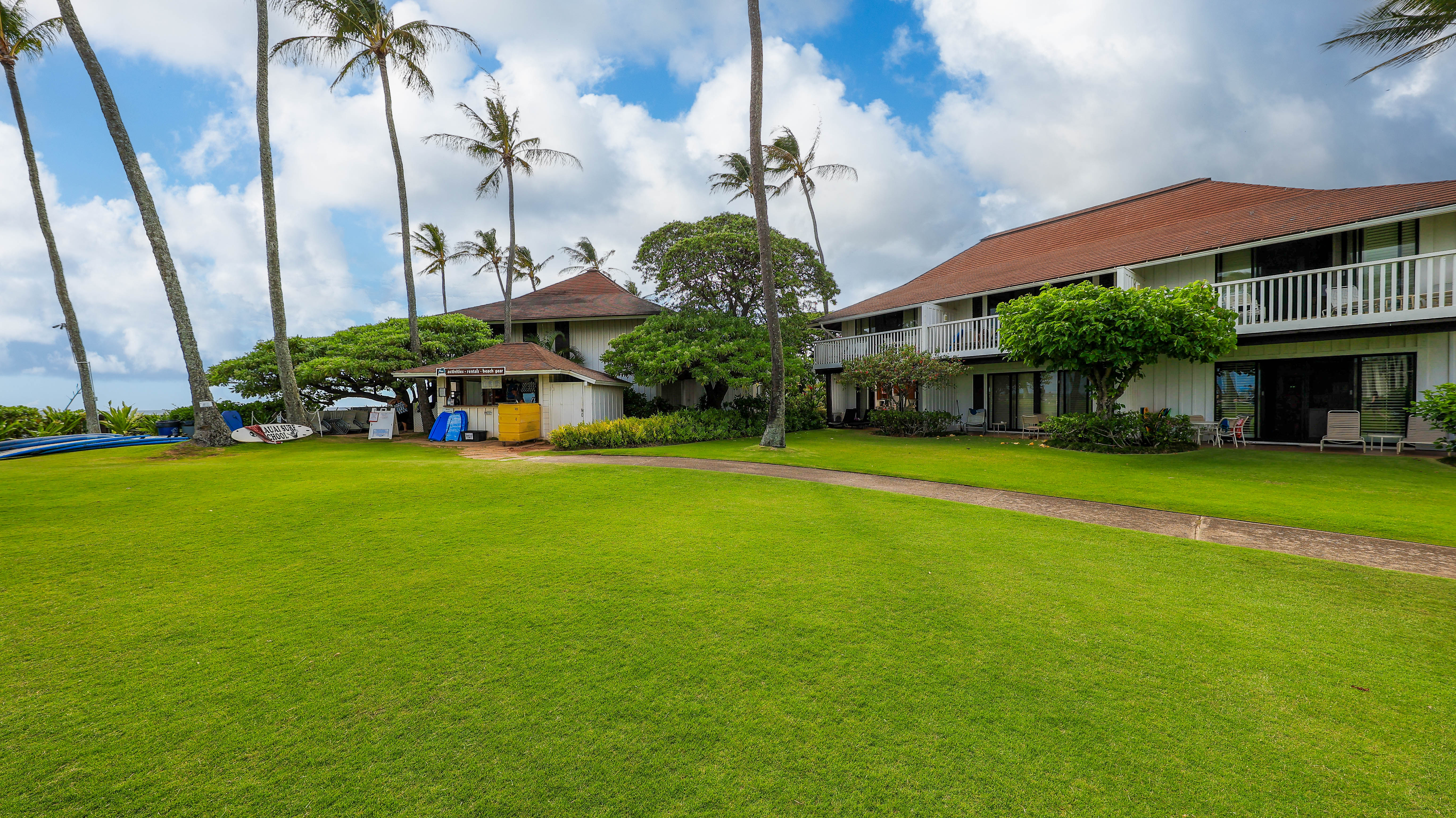 2253 Poipu Road, Unit 183 Koloa, HI 96756 - Photo 22 of 30 a front view of house with yard and green space