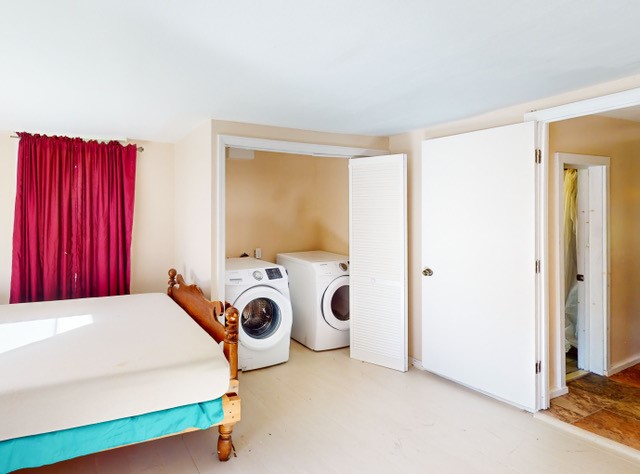 597 Greenough Road Hartwick, NY 13326 - Photo 7 of 19 First floor bedroom with laundry