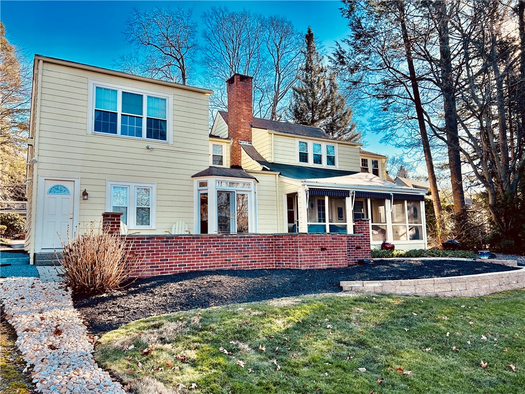 63 White Birch Road Cranston, RI 02920 - Photo 4 of 29 Rear view, brick patio & screened porch