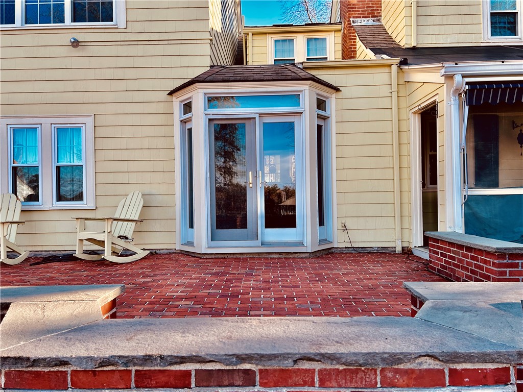 63 White Birch Road Cranston, RI 02920 - Photo 5 of 29 Access from screened porch and dining area