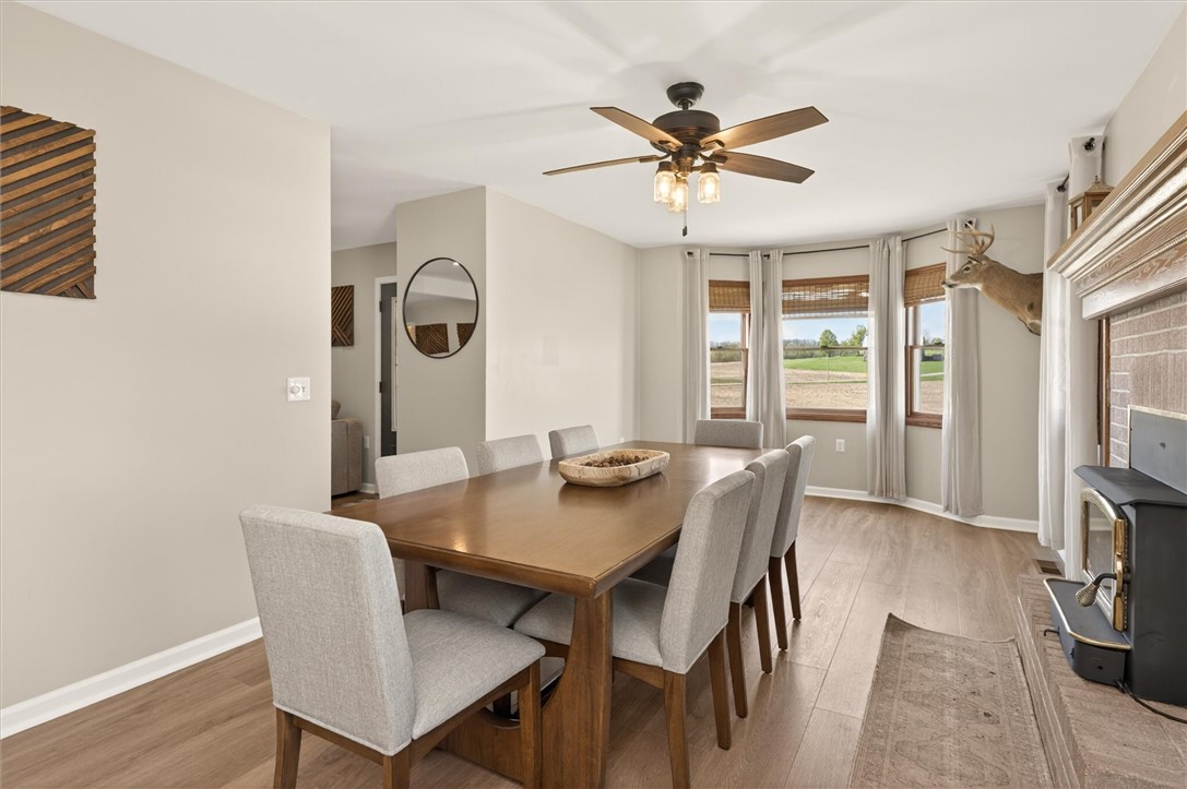 5601 Stuart Avenue Arcadia, NY 14513 - Photo 27 of 50 Bay Windows in Dining Room With Woodstove Chimney