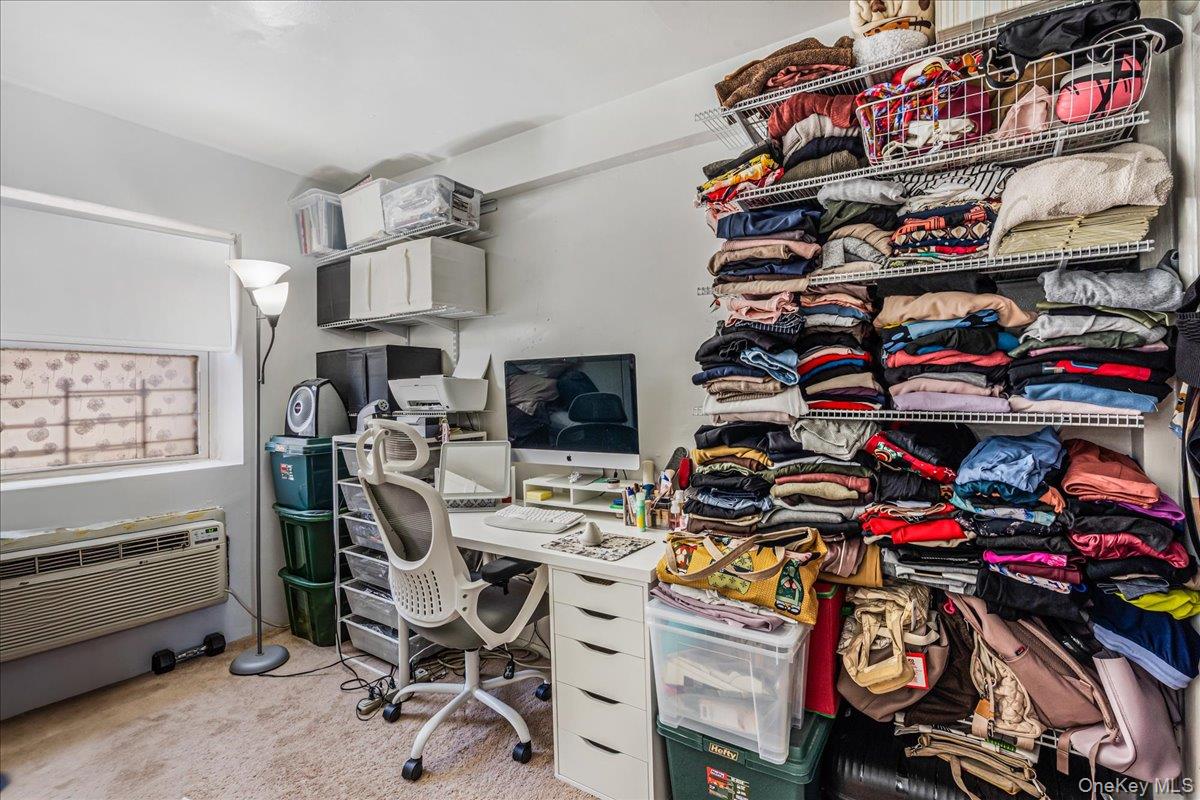 144-55 Melbourne Avenue, Unit 6E Queens, NY 11367 - Photo 16 of 24 Office area featuring a wall mounted AC and light carpet