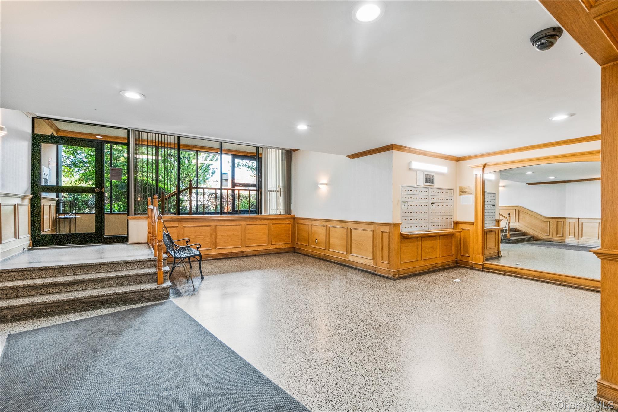 144-55 Melbourne Avenue, Unit 6E Queens, NY 11367 - Photo 3 of 24 Lobby featuring wainscoting, a decorative wall, and recessed lighting