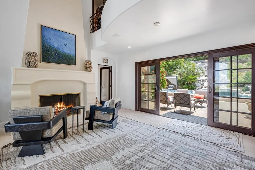 2643 Hidden Valley Road La Jolla, CA 92037 - Photo 54 of 75 a living room with furniture and a fireplace