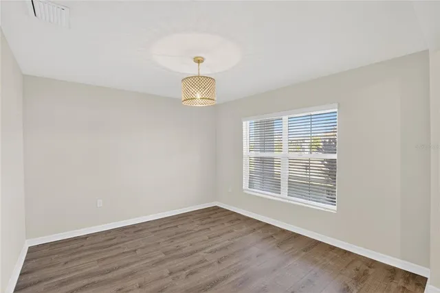 a kitchen with stainless steel appliances granite countertop a stove a sink dishwasher and a refrigerator