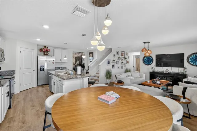 a living room with furniture and a table
