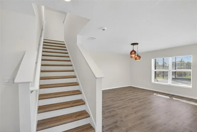 a view of hallway with closet